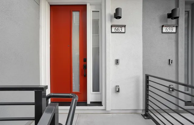 a view of a hallway with seating area