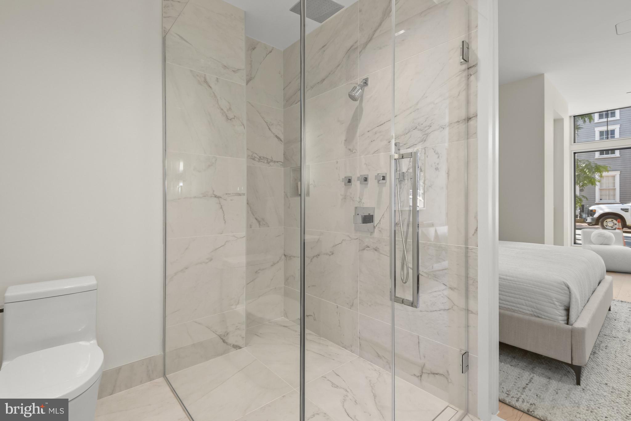 3255 Prospect Street Northwest, Unit ONE Washington, DC 20007 - Photo 15 of 18 a bathroom with a shower and toilet