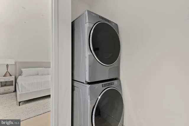 a close view of a utility room with washer and dryer