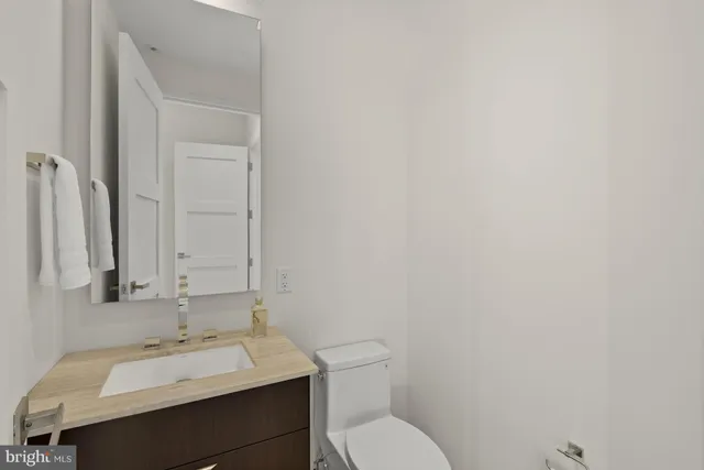a bathroom with a sink and a toilet