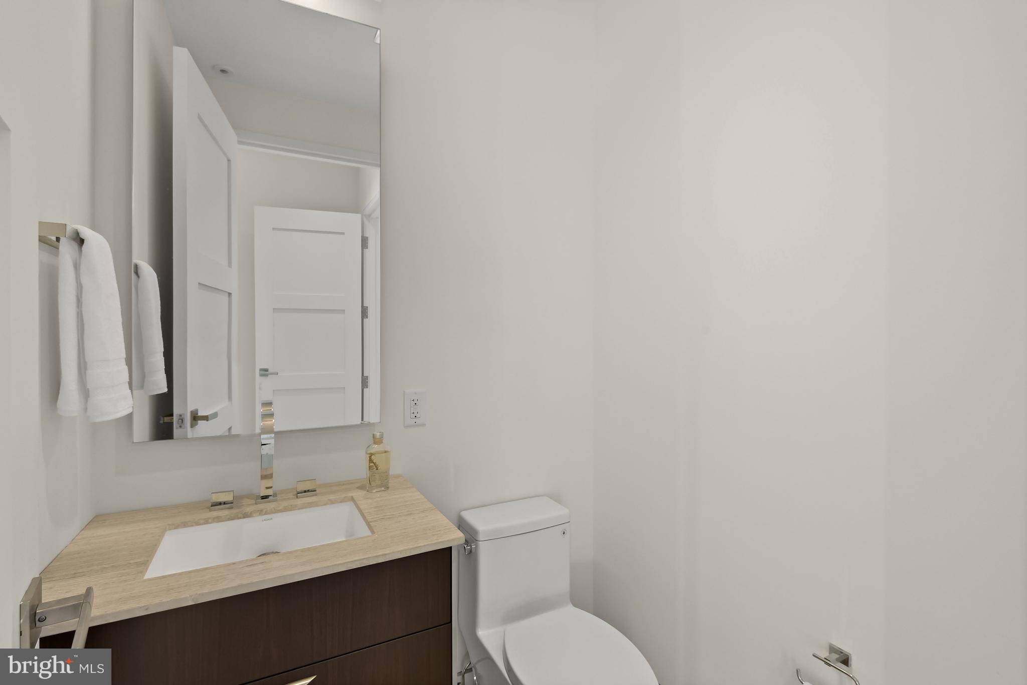 3255 Prospect Street Northwest, Unit ONE Washington, DC 20007 - Photo 18 of 18 a bathroom with a sink and a toilet