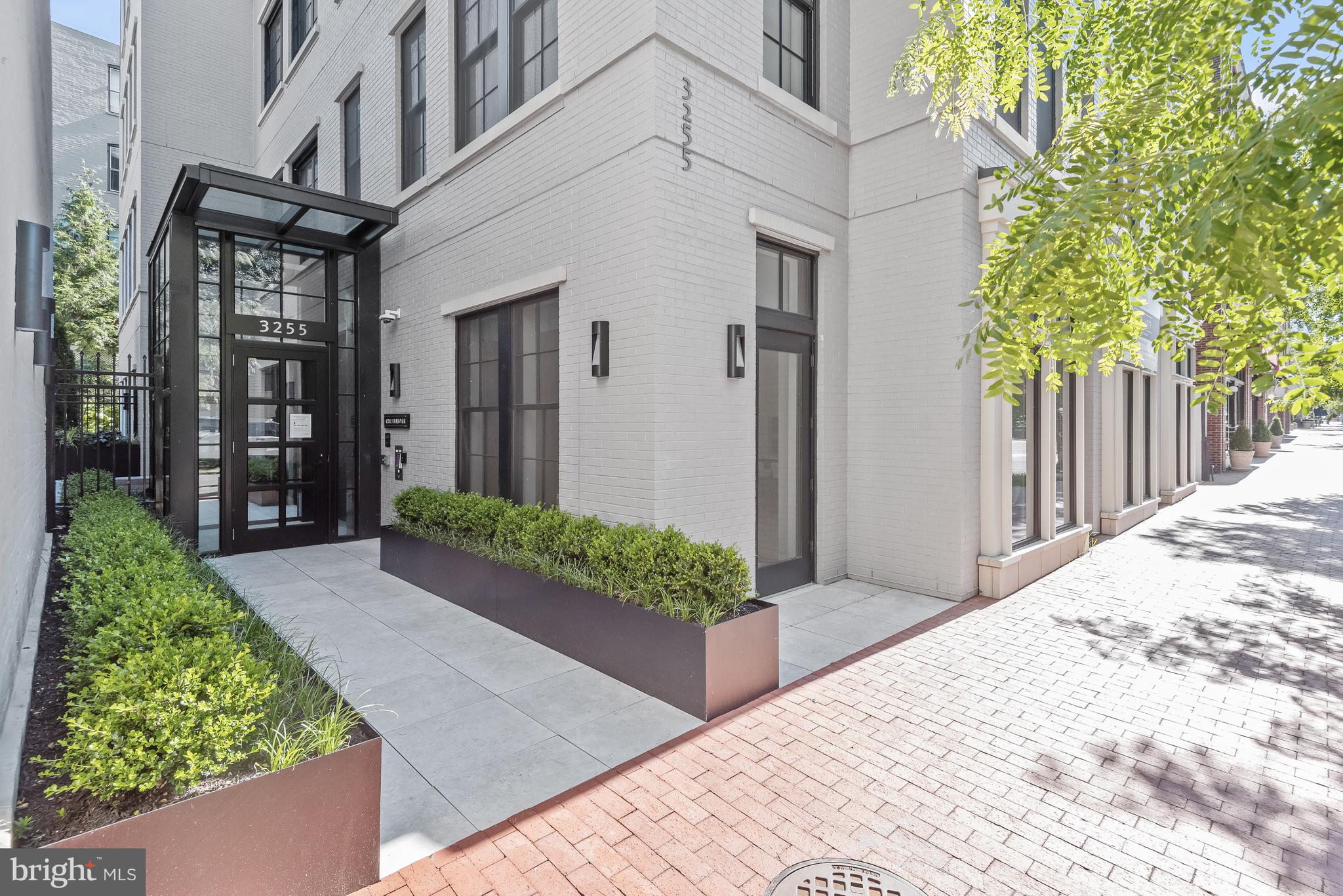 3255 Prospect Street Northwest, Unit ONE Washington, DC 20007 - Photo 2 of 18 a view of a house with a garden