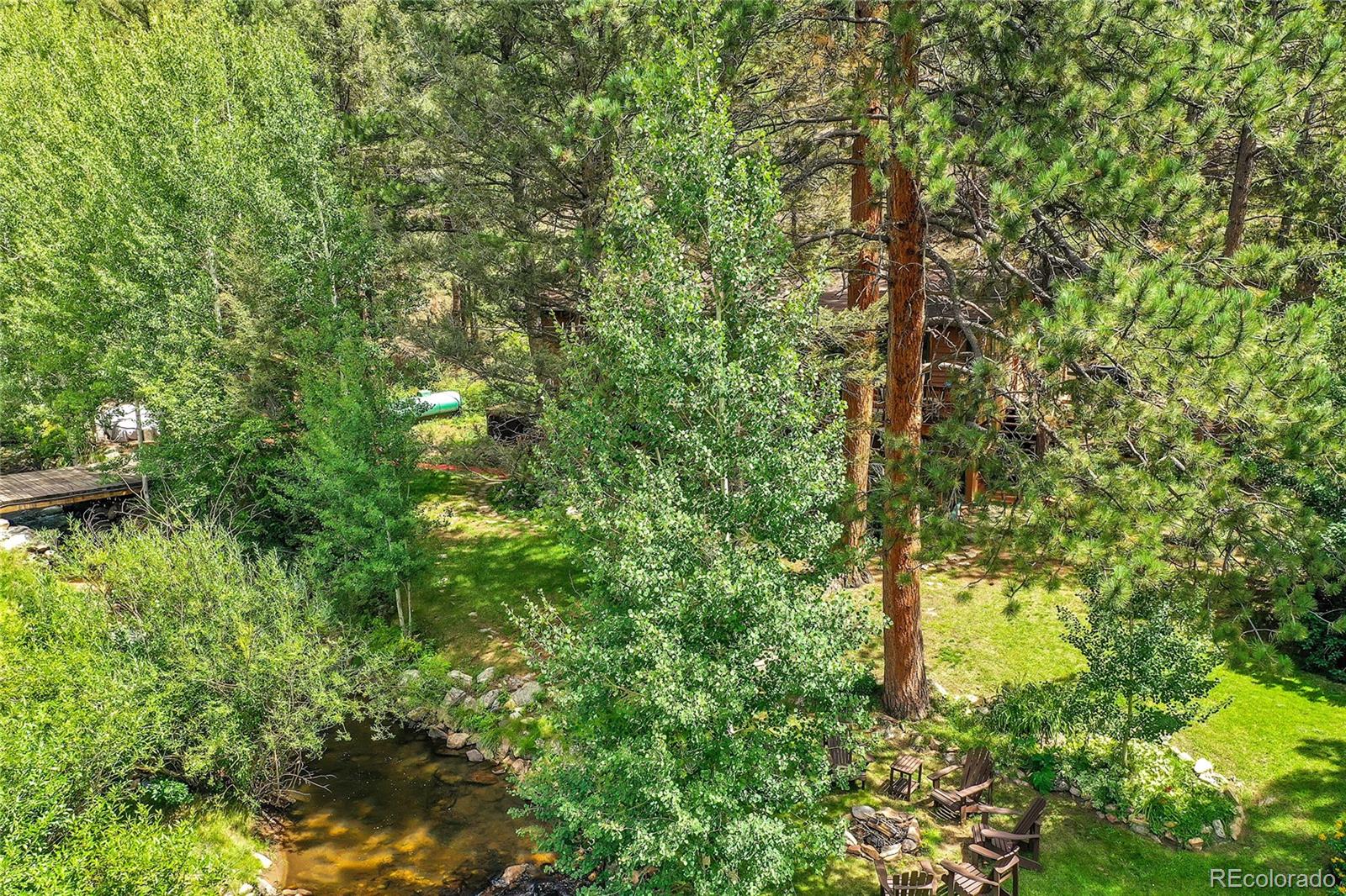 14432 South Elk Creek Road Pine, CO 80470 - Photo 27 of 50 a view of a garden