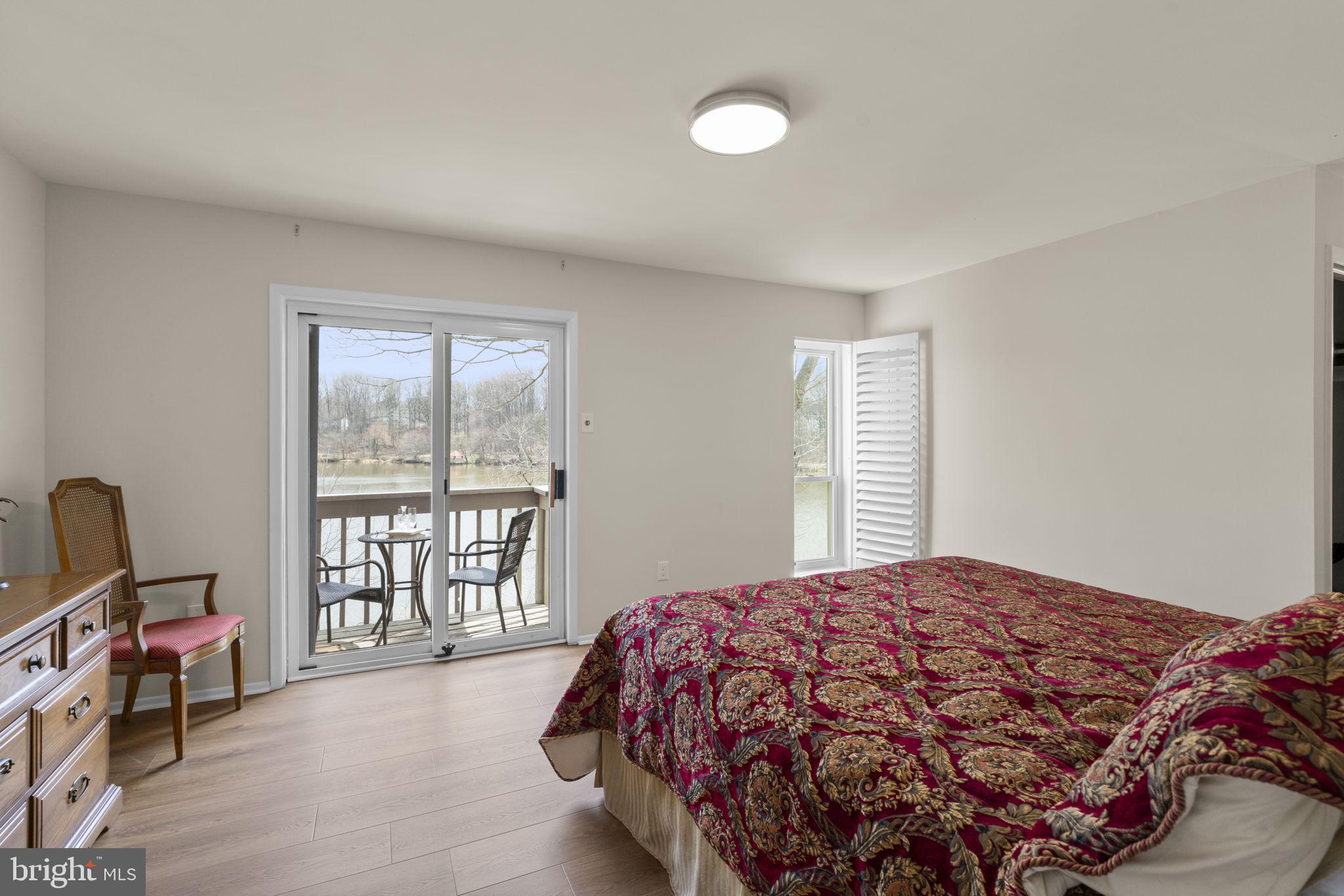 7263 Dockside Lane Columbia, MD 21045 - Photo 16 of 56 Primary Bedroom with Lakefront views