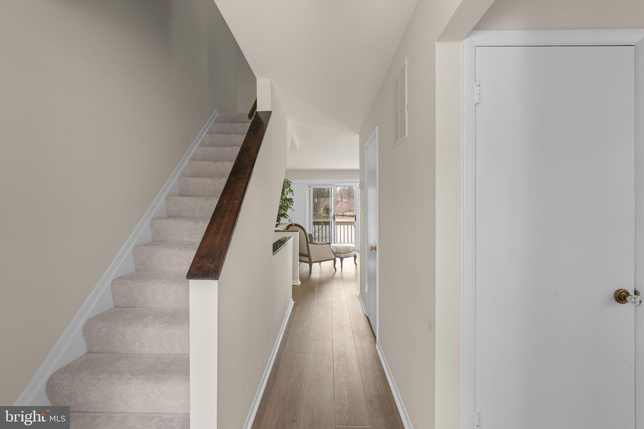 7263 Dockside Lane Columbia, MD 21045 - Photo 6 of 56 Main entrance leads to the living room with a view