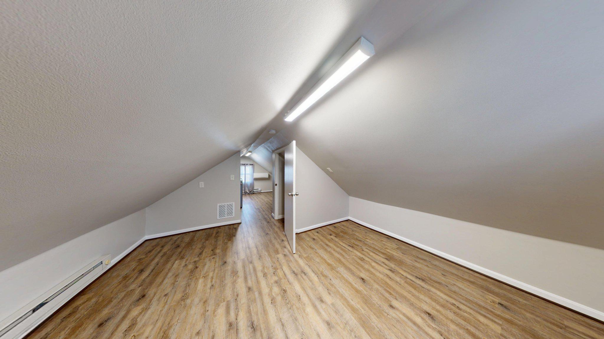 7711 Fairgreen Road Dundalk, MD 21222 - Photo 16 of 18 Spacious upstairs bedroom with modern finishes.
