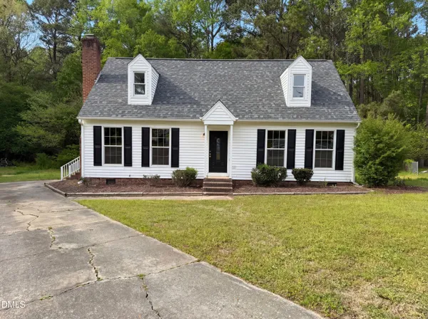 a front view of a house with swimming pool
