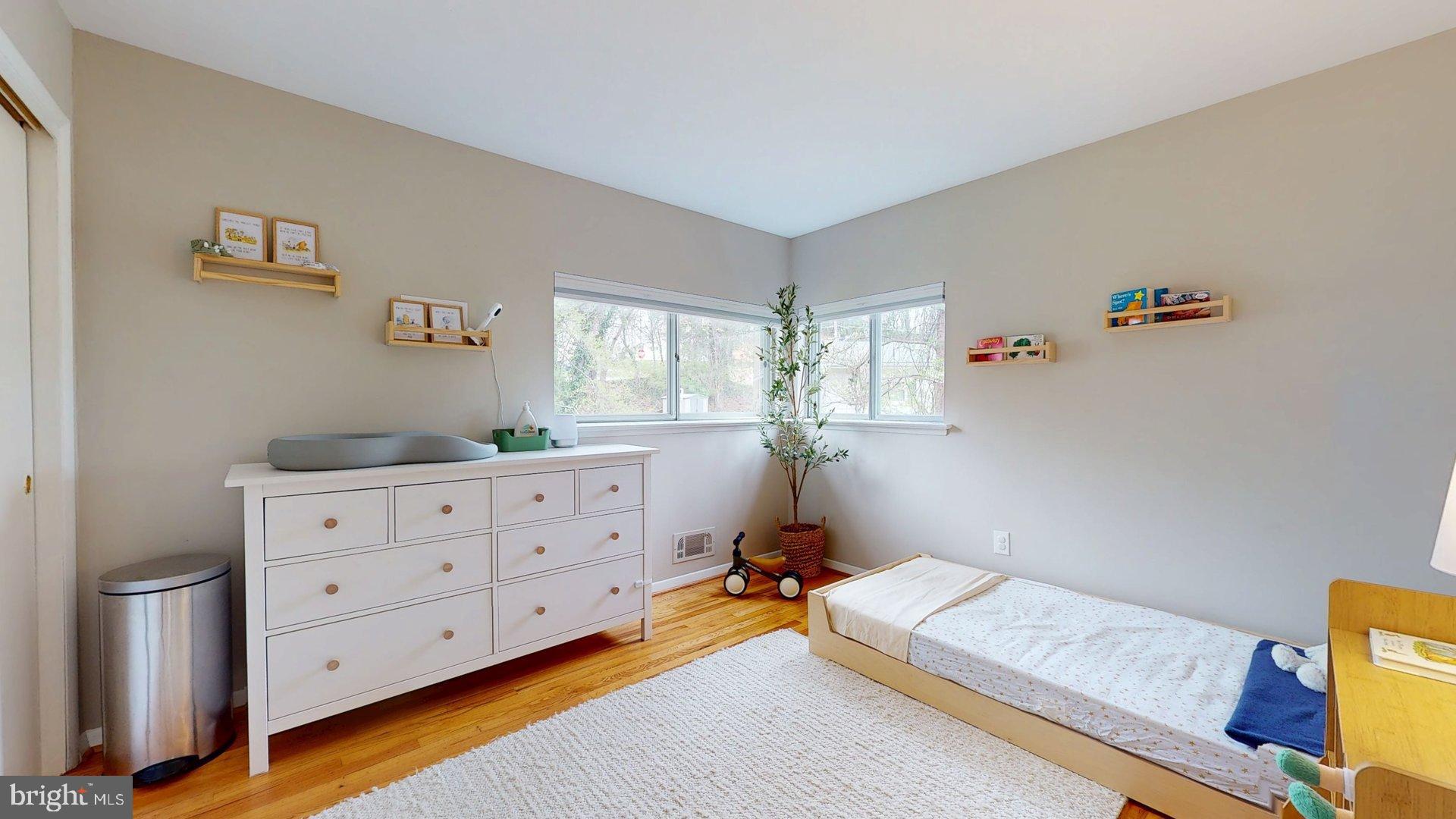 6334 Alberta Street Springfield, VA 22152 - Photo 12 of 28 a bedroom with a bed and a window in it