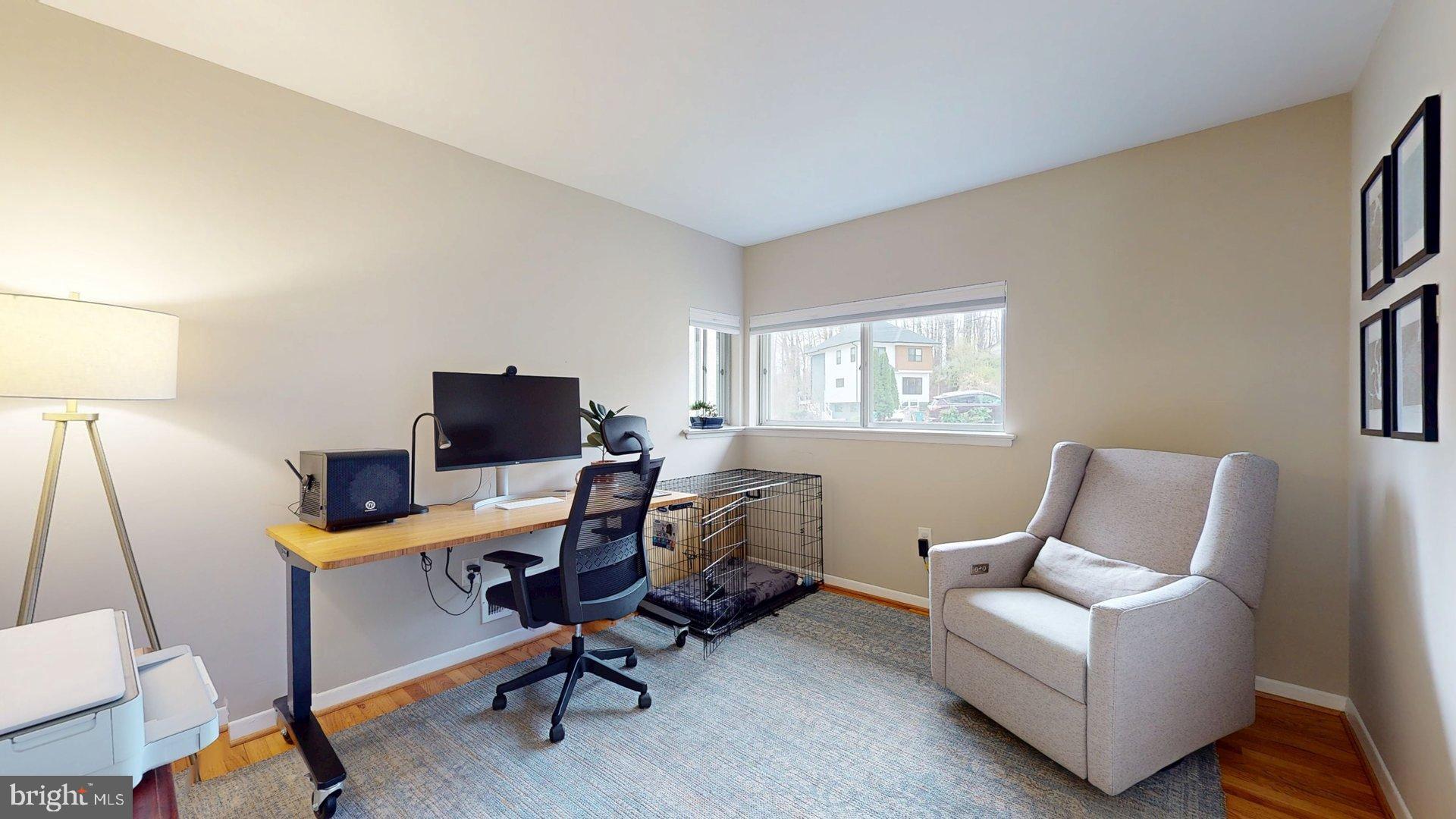 6334 Alberta Street Springfield, VA 22152 - Photo 14 of 28 a view of a livingroom with workspace and a couch