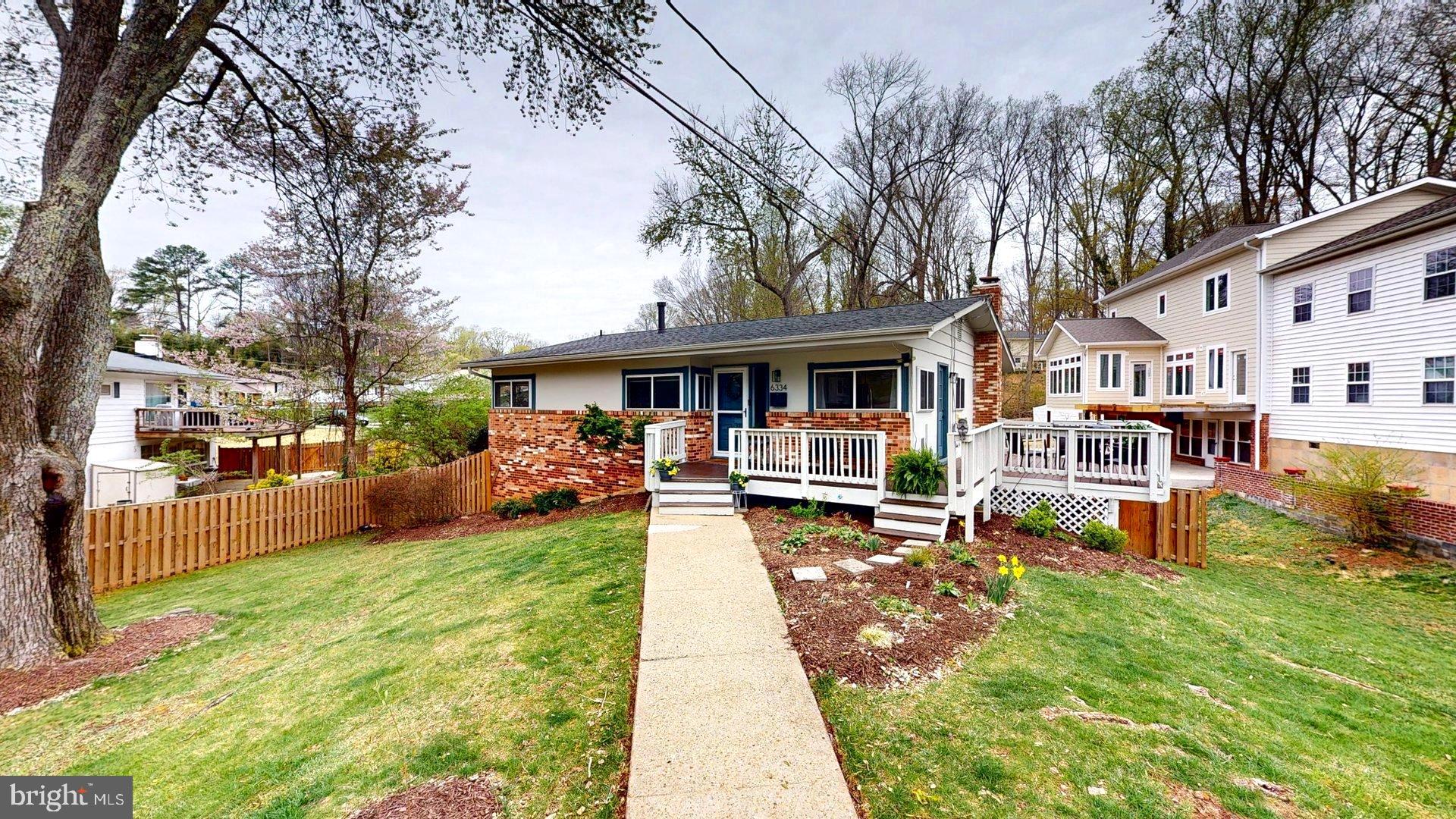 6334 Alberta Street Springfield, VA 22152 - Photo 2 of 28 a view of a house with swimming pool and sitting area
