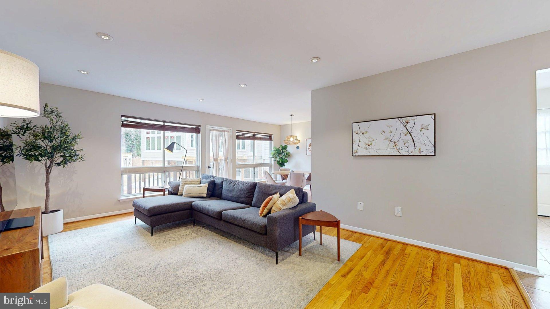 6334 Alberta Street Springfield, VA 22152 - Photo 4 of 28 a living room with furniture and a potted plant