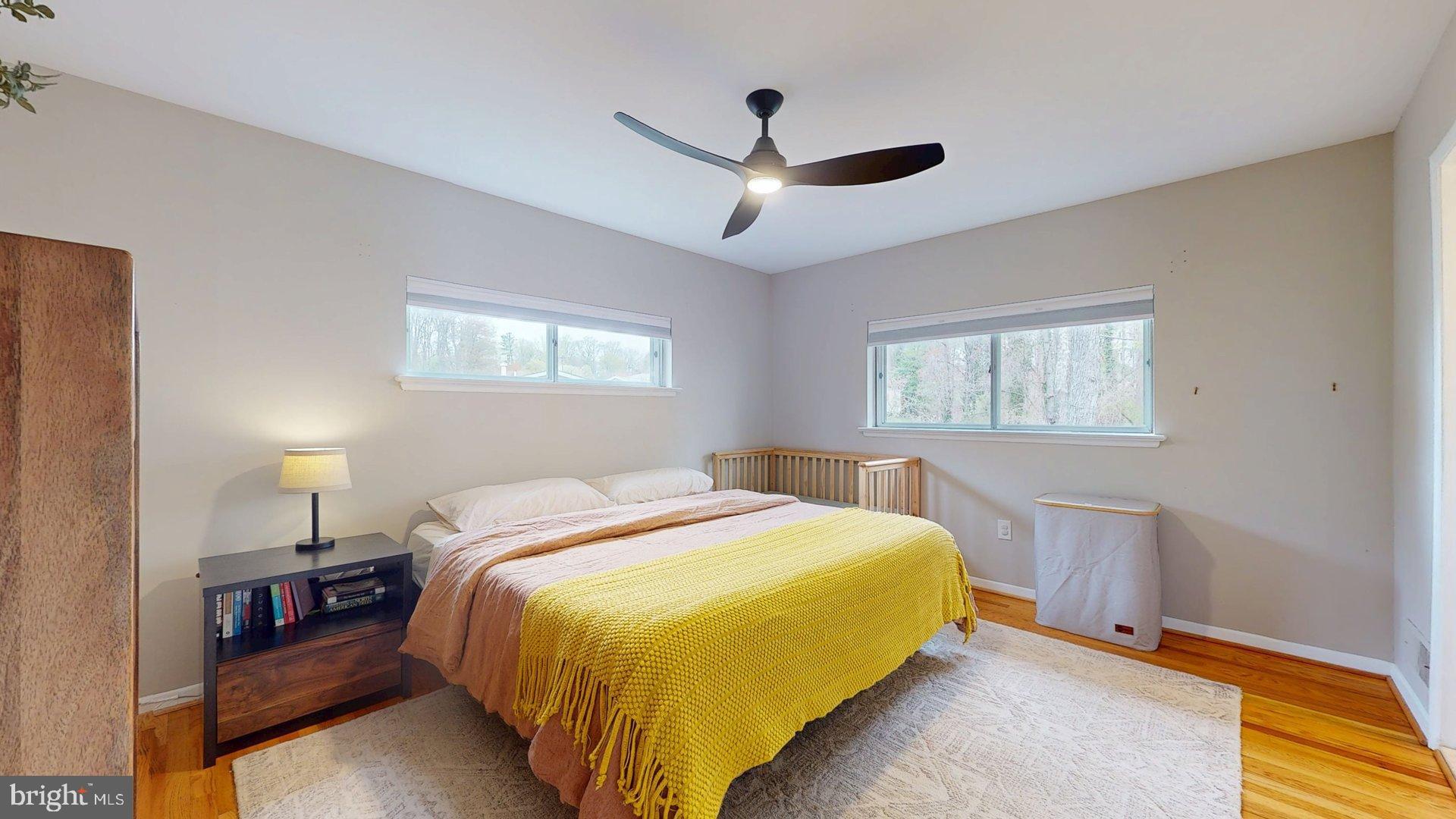 6334 Alberta Street Springfield, VA 22152 - Photo 9 of 28 a bedroom with a bed and window