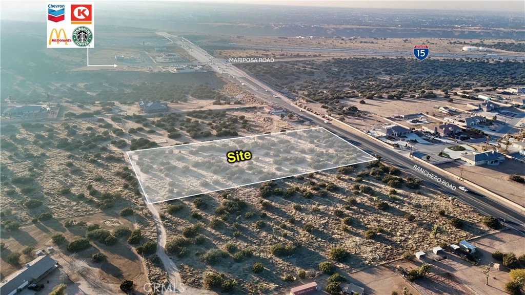 0 Ranchero Road Oak Hills, CA 92344 - Photo 5 of 5 an aerial view of residential houses with outdoor space