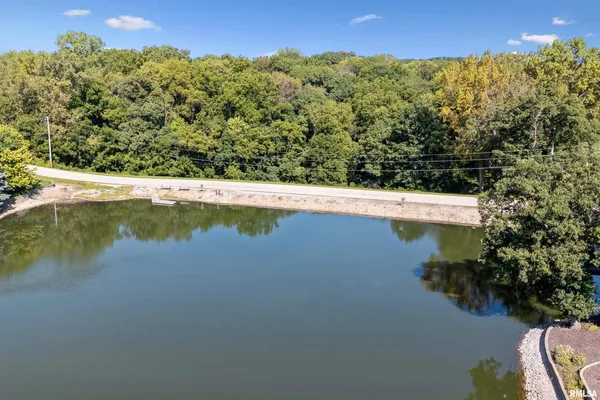 a view of a lake from a balcony