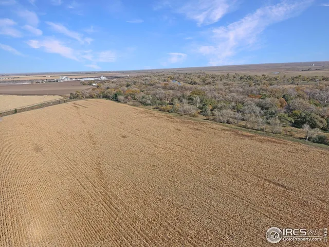 an aerial view of beach and city space