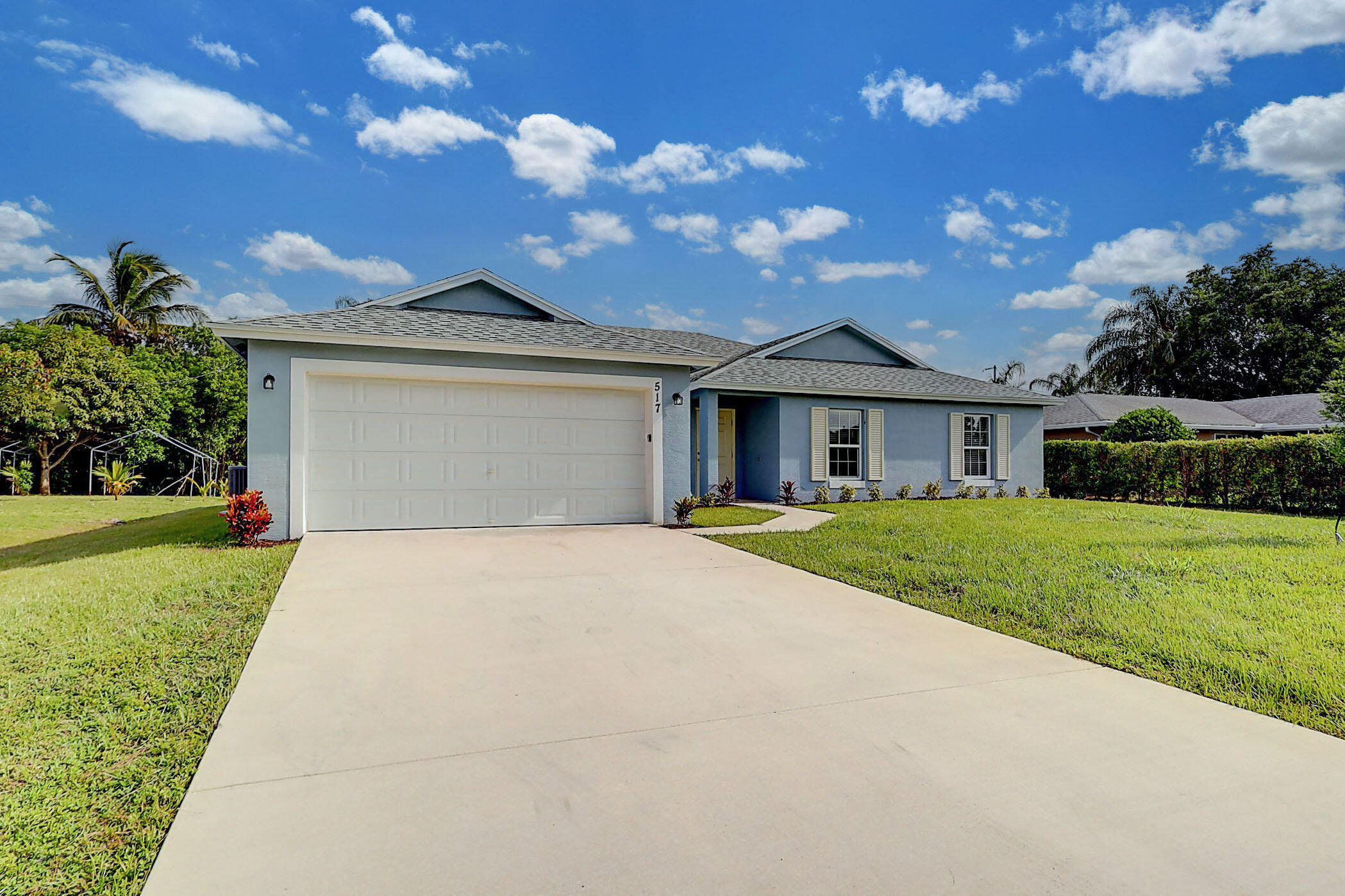 517 Southwest Ray Avenue Port St. Lucie, FL 34983 - Photo 1 of 17 Front BEST - Copy