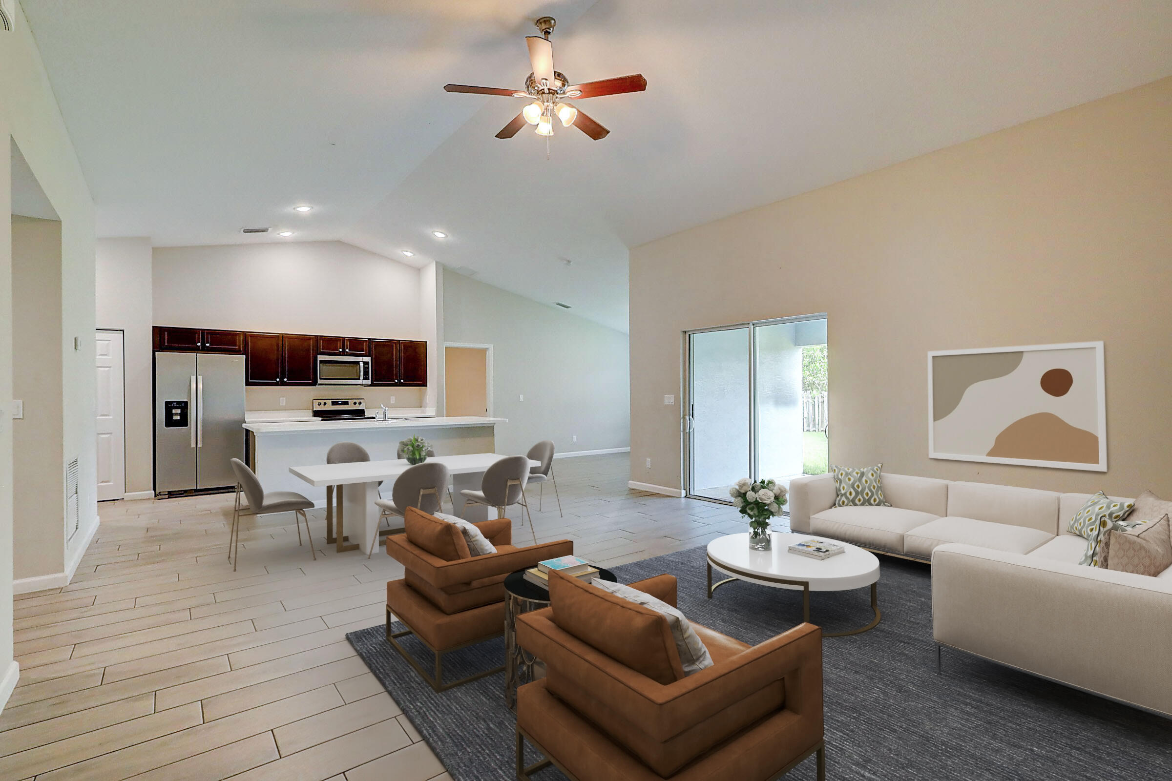 517 Southwest Ray Avenue Port St. Lucie, FL 34983 - Photo 2 of 17 Great room to kitchen Virtually Staged