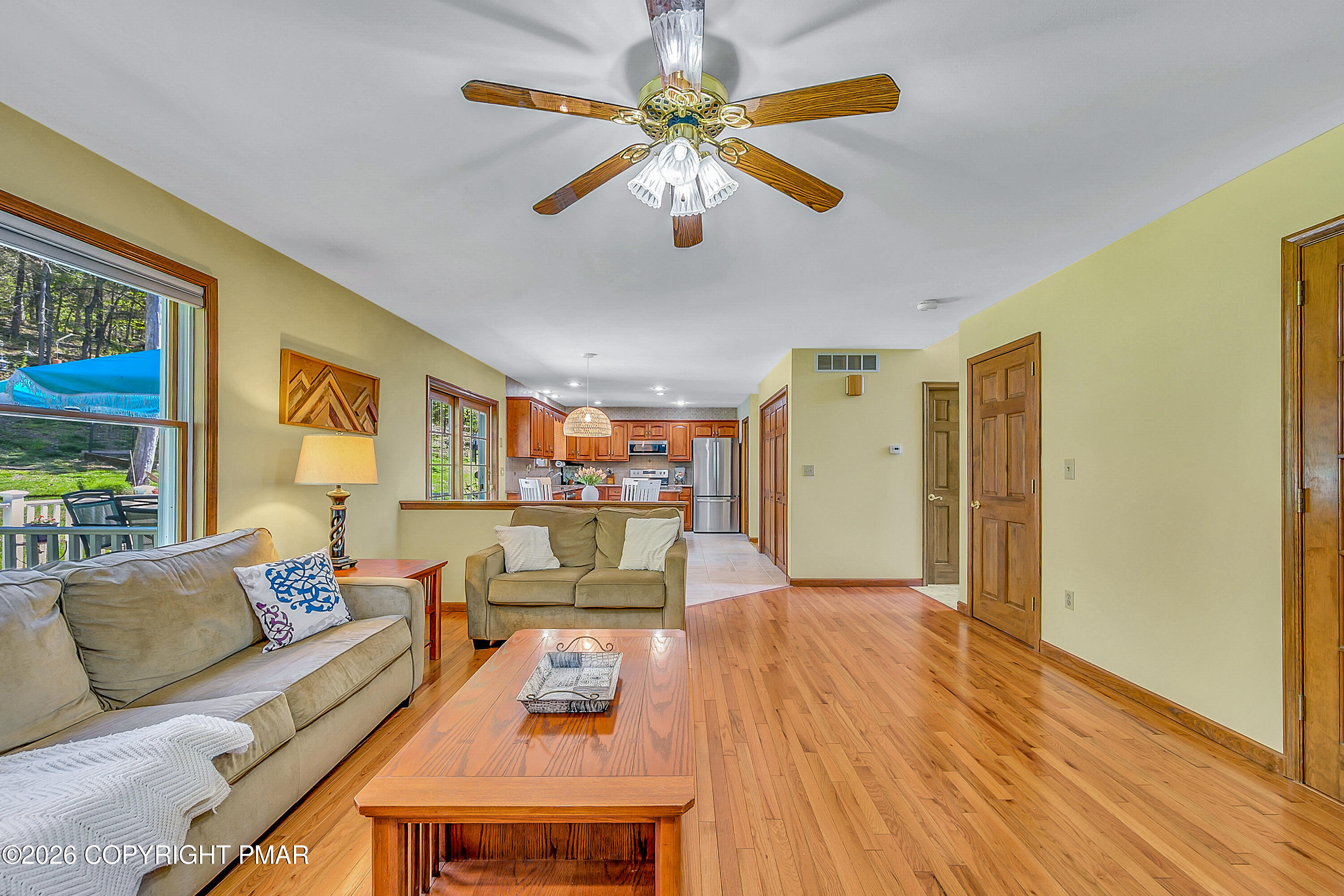 207 Smiley Lane Stroudsburg, PA 18360 - Photo 14 of 85 a living room with furniture and a chandelier