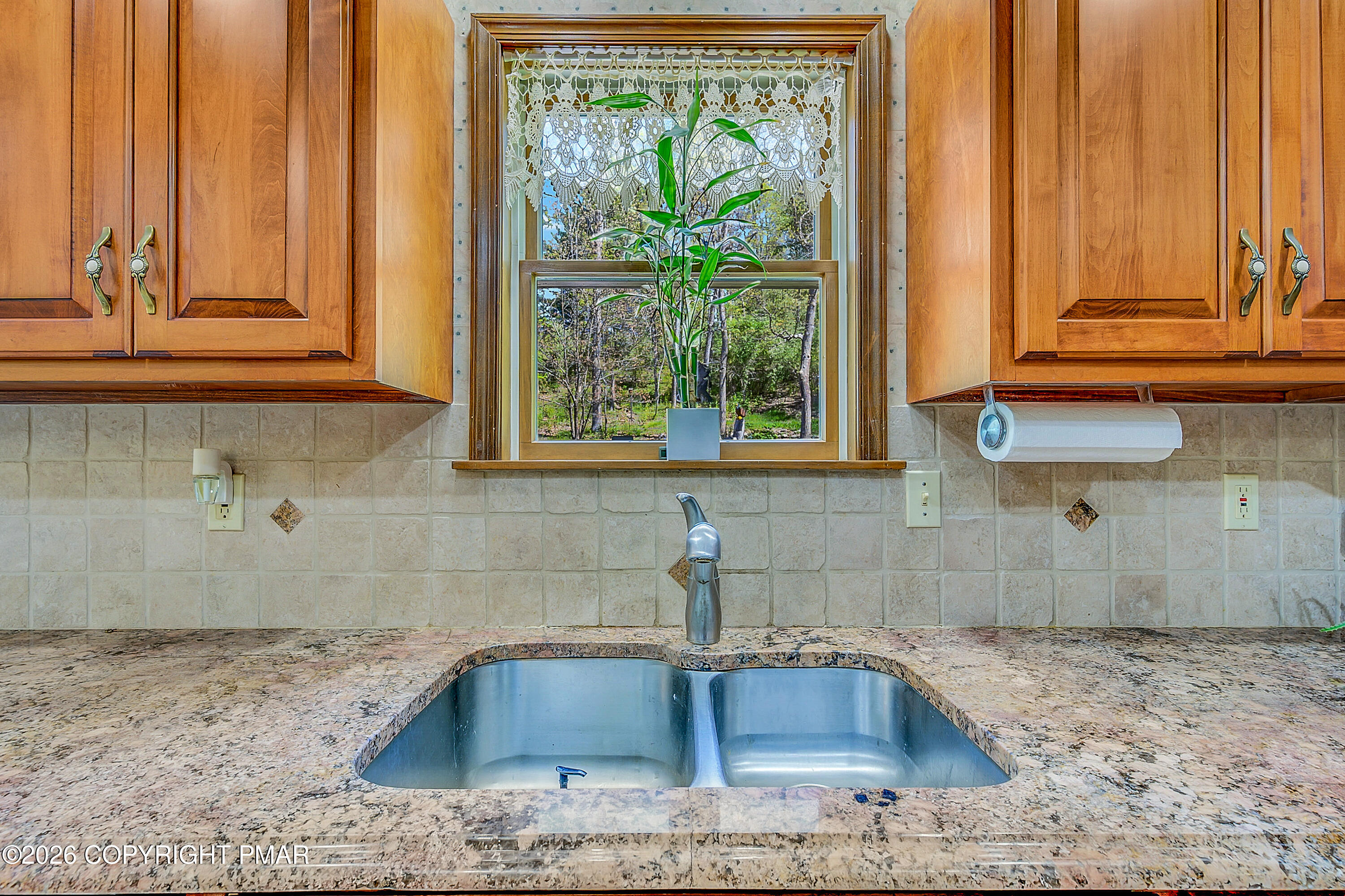 207 Smiley Lane Stroudsburg, PA 18360 - Photo 22 of 85 a bathroom with a granite countertop sink and a window