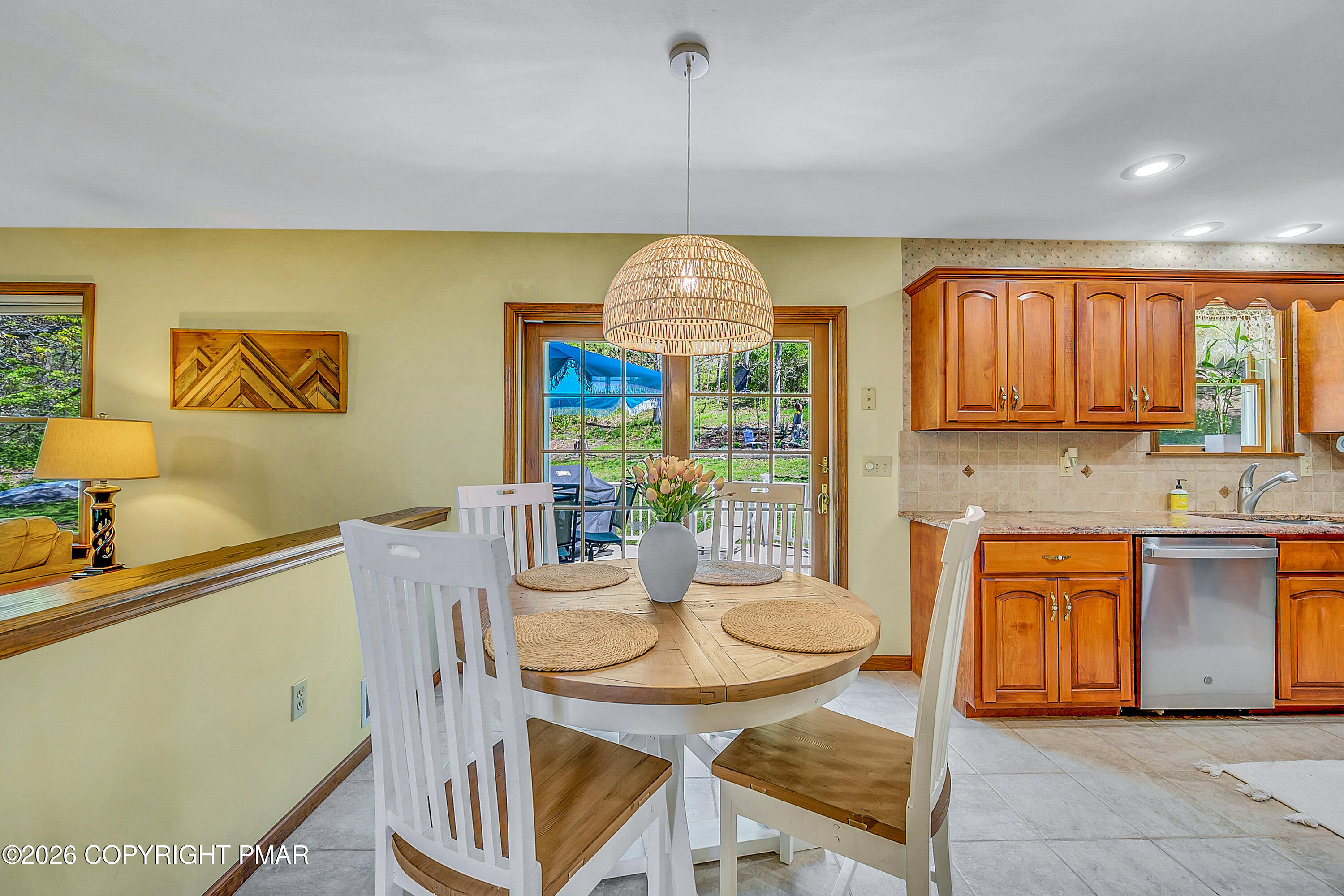207 Smiley Lane Stroudsburg, PA 18360 - Photo 24 of 85 a dining room with furniture a window and a chandelier