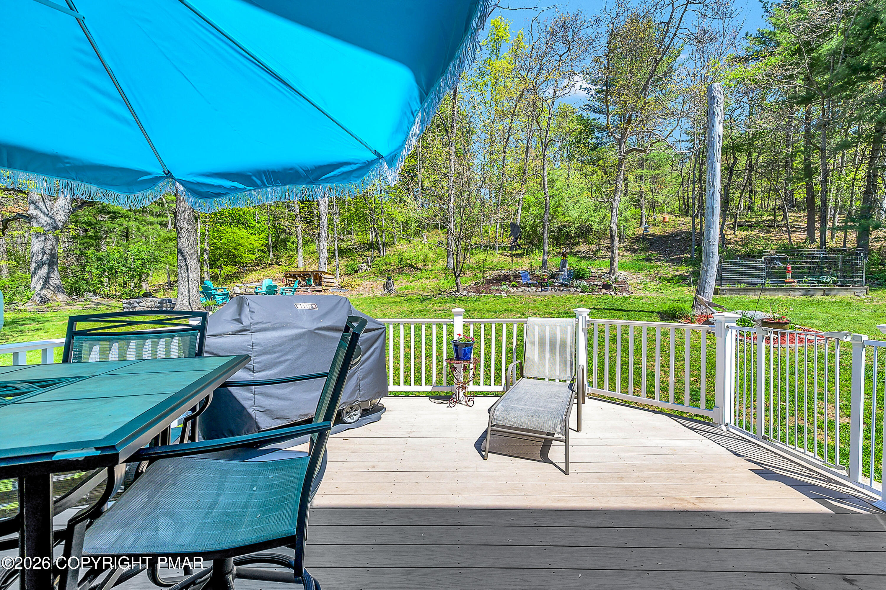 207 Smiley Lane Stroudsburg, PA 18360 - Photo 25 of 85 a view of a patio with a table chairs and a backyard