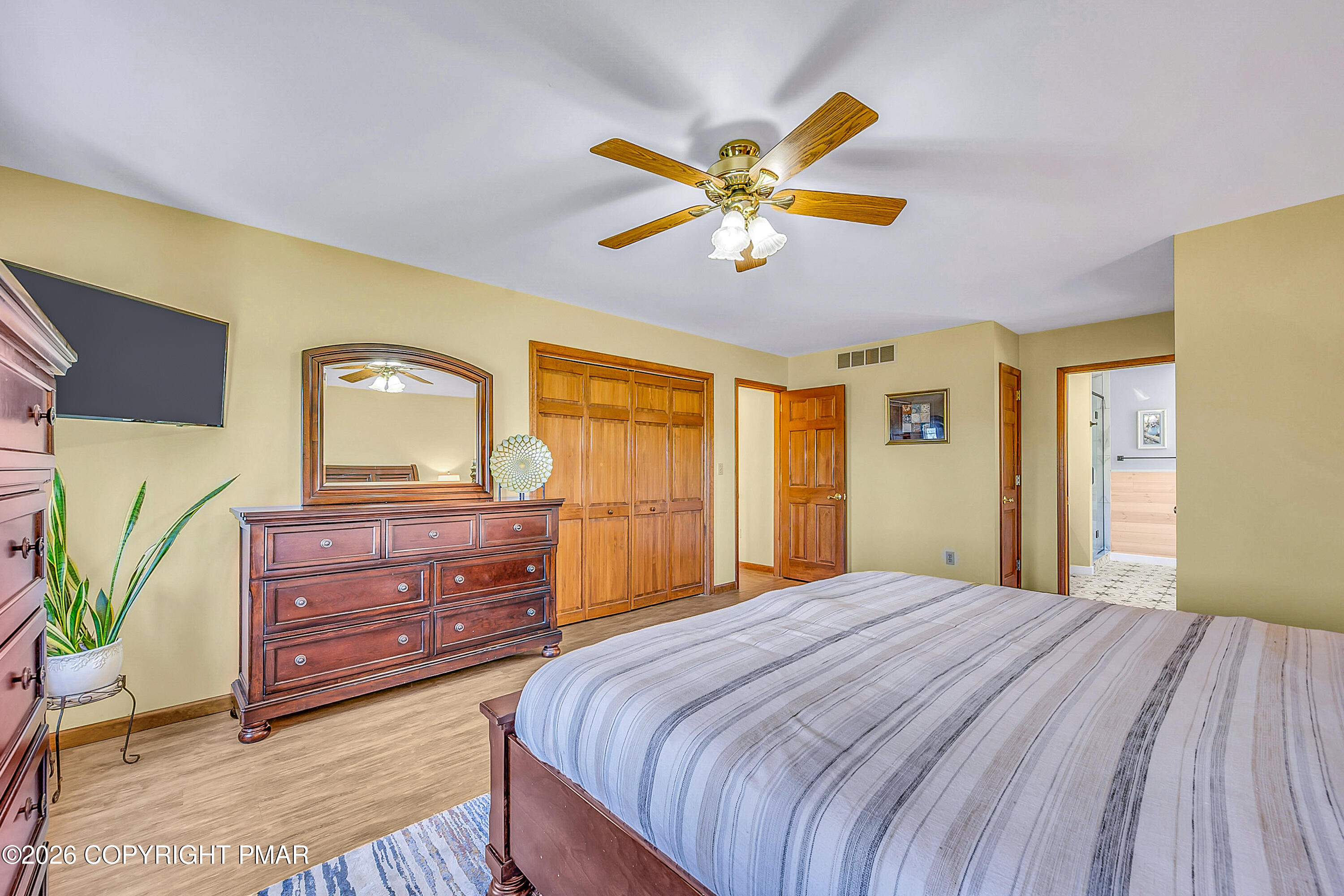 207 Smiley Lane Stroudsburg, PA 18360 - Photo 31 of 85 a bedroom with a bed and a dresser