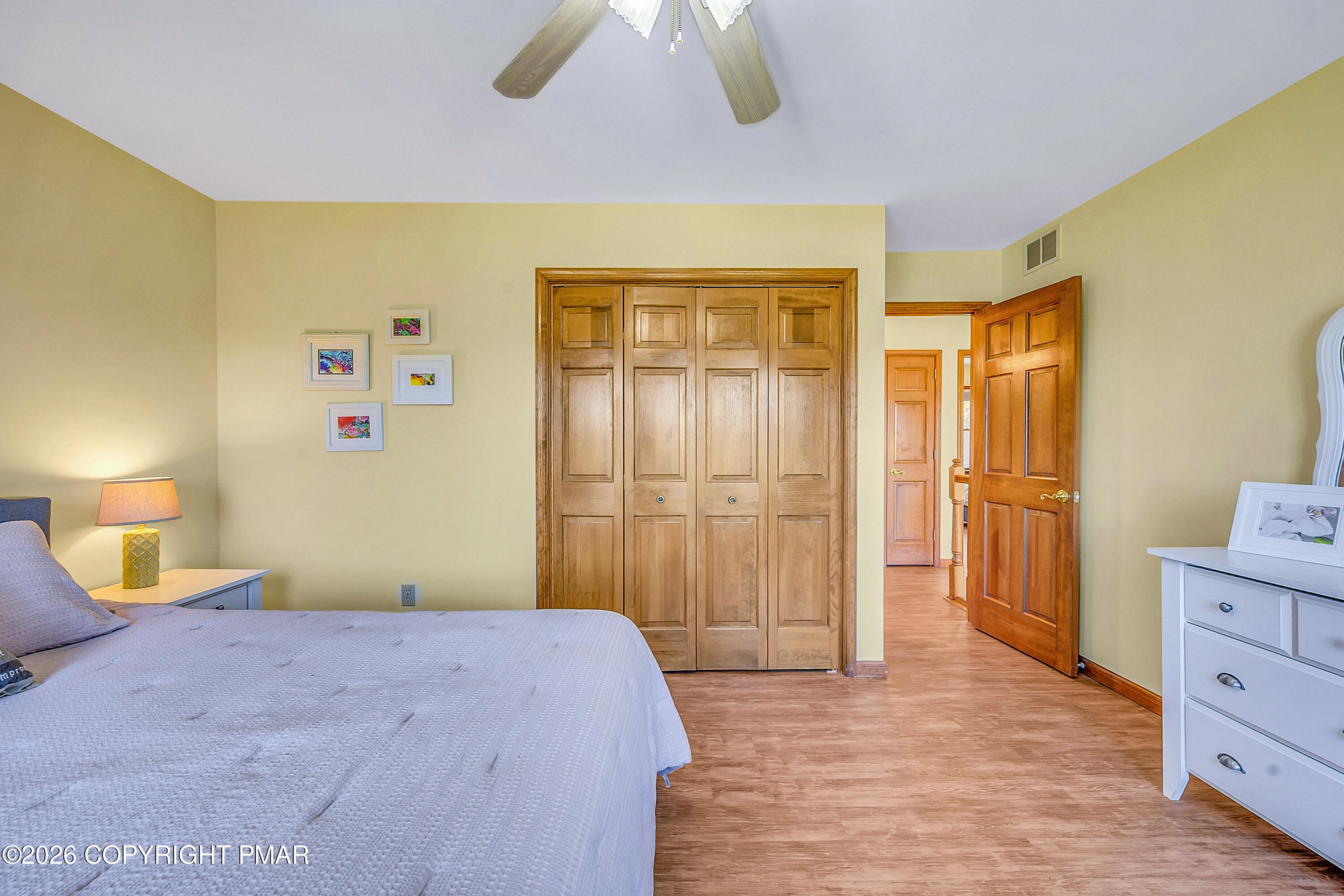 207 Smiley Lane Stroudsburg, PA 18360 - Photo 38 of 85 a bedroom with a bed and wooden floor