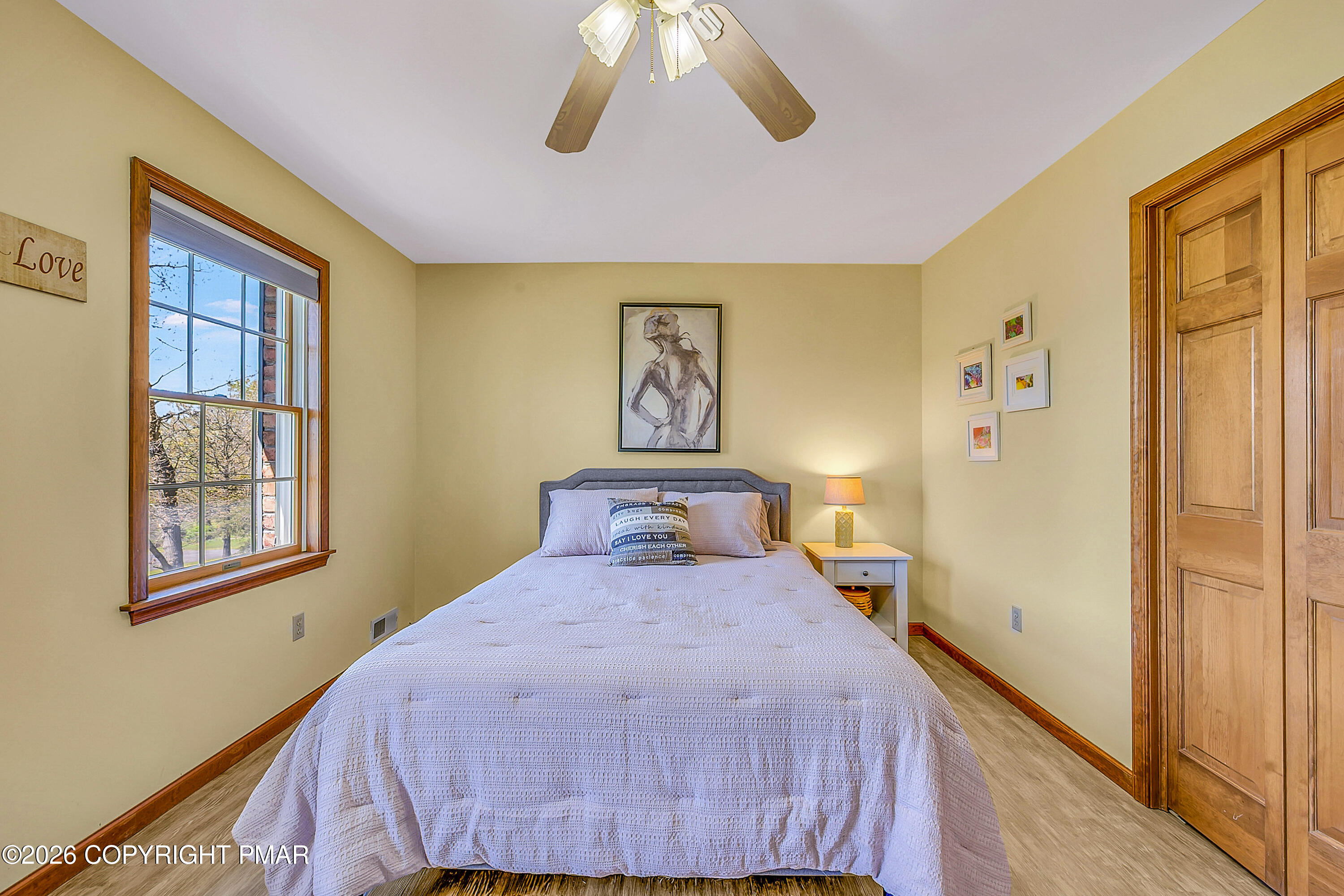 207 Smiley Lane Stroudsburg, PA 18360 - Photo 39 of 85 a bedroom with a bed and a window