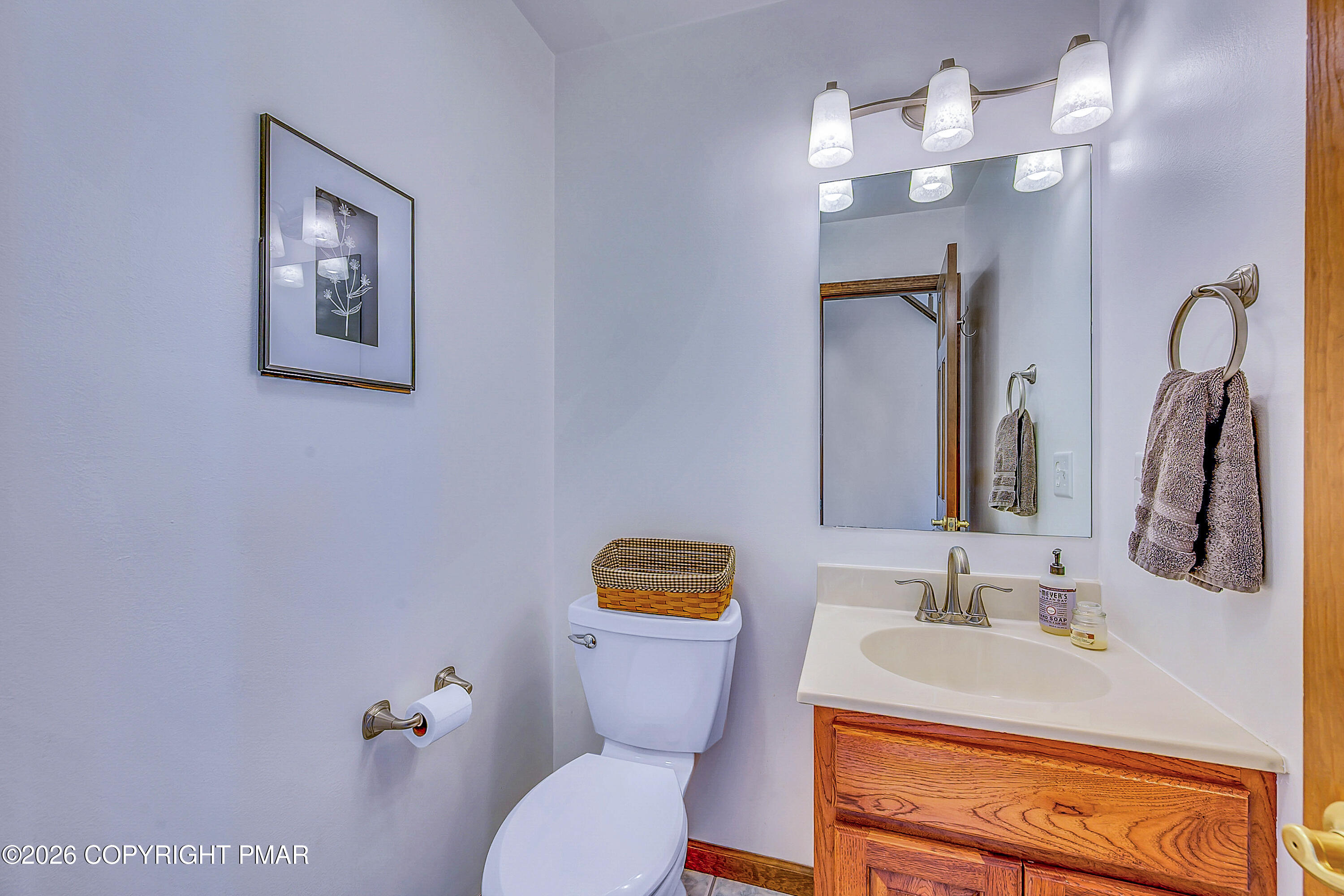 207 Smiley Lane Stroudsburg, PA 18360 - Photo 48 of 85 a bathroom with a toilet a sink and mirror