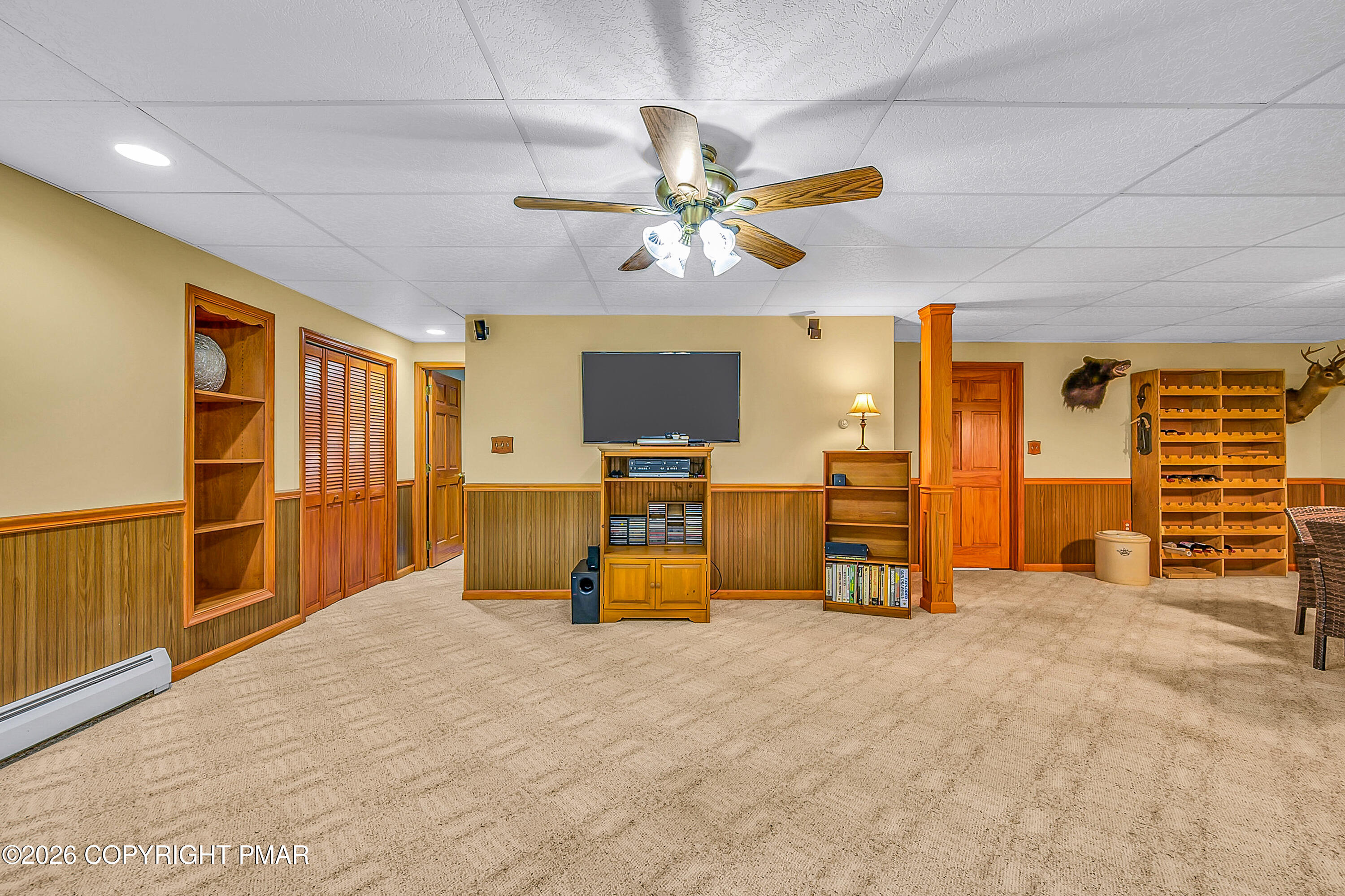 207 Smiley Lane Stroudsburg, PA 18360 - Photo 53 of 85 a view of a livingroom with a flat furniture and a flat screen tv