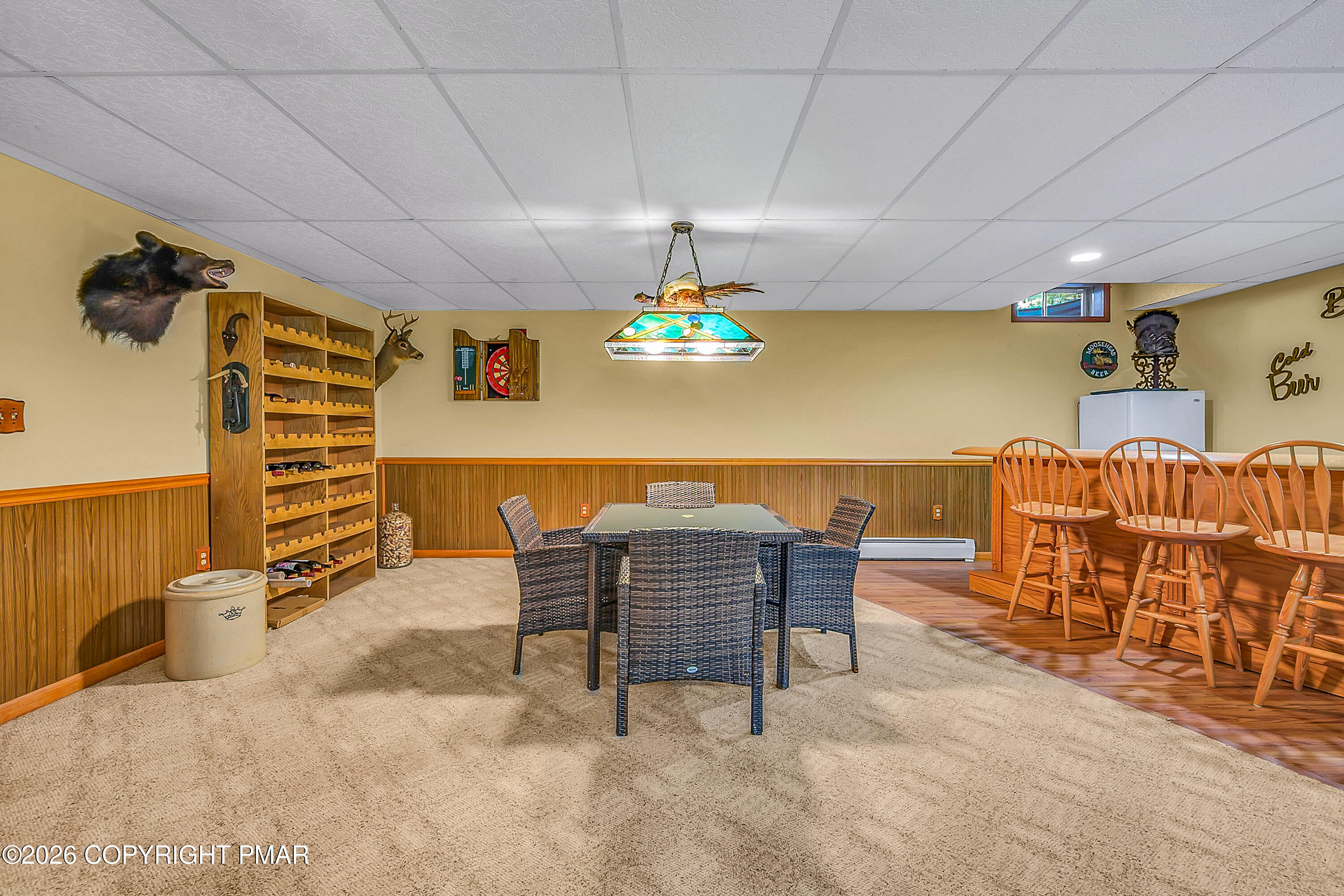 207 Smiley Lane Stroudsburg, PA 18360 - Photo 54 of 85 a dining room with furniture and a chandelier