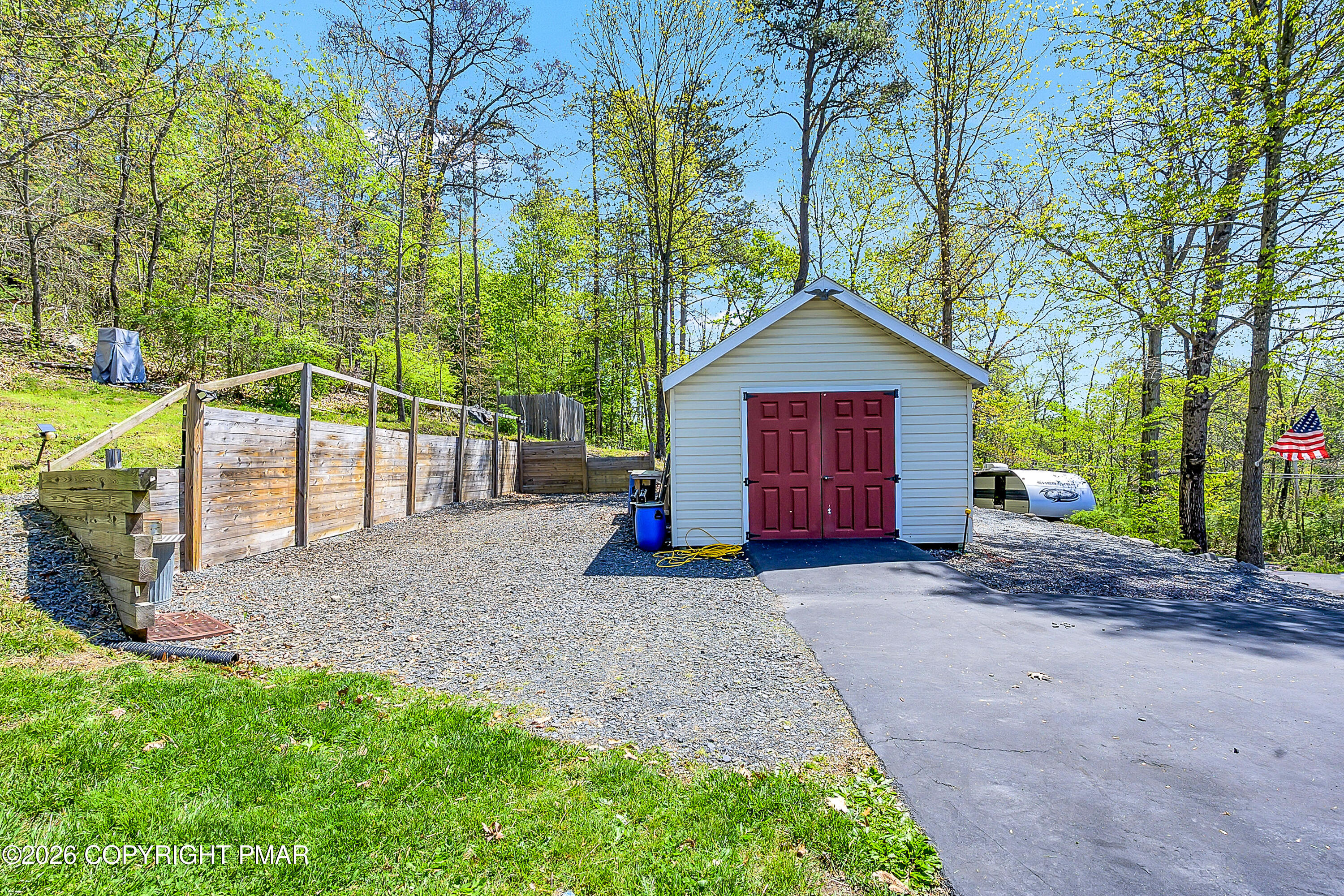 207 Smiley Lane Stroudsburg, PA 18360 - Photo 68 of 85 a view of a house with a yard and garden