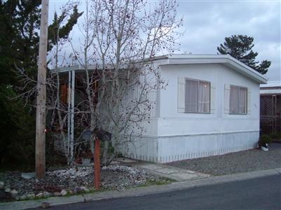 294 Yosemite Road, Unit 294 San Rafael, CA 94903 - Photo 1 of 7 a front view of a house with garden