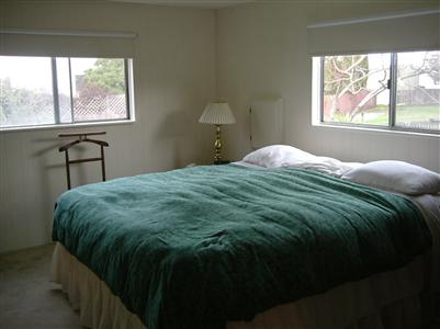 294 Yosemite Road, Unit 294 San Rafael, CA 94903 - Photo 5 of 7 a bedroom with a bed and a window