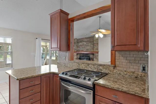 a kitchen with a stove and a sink