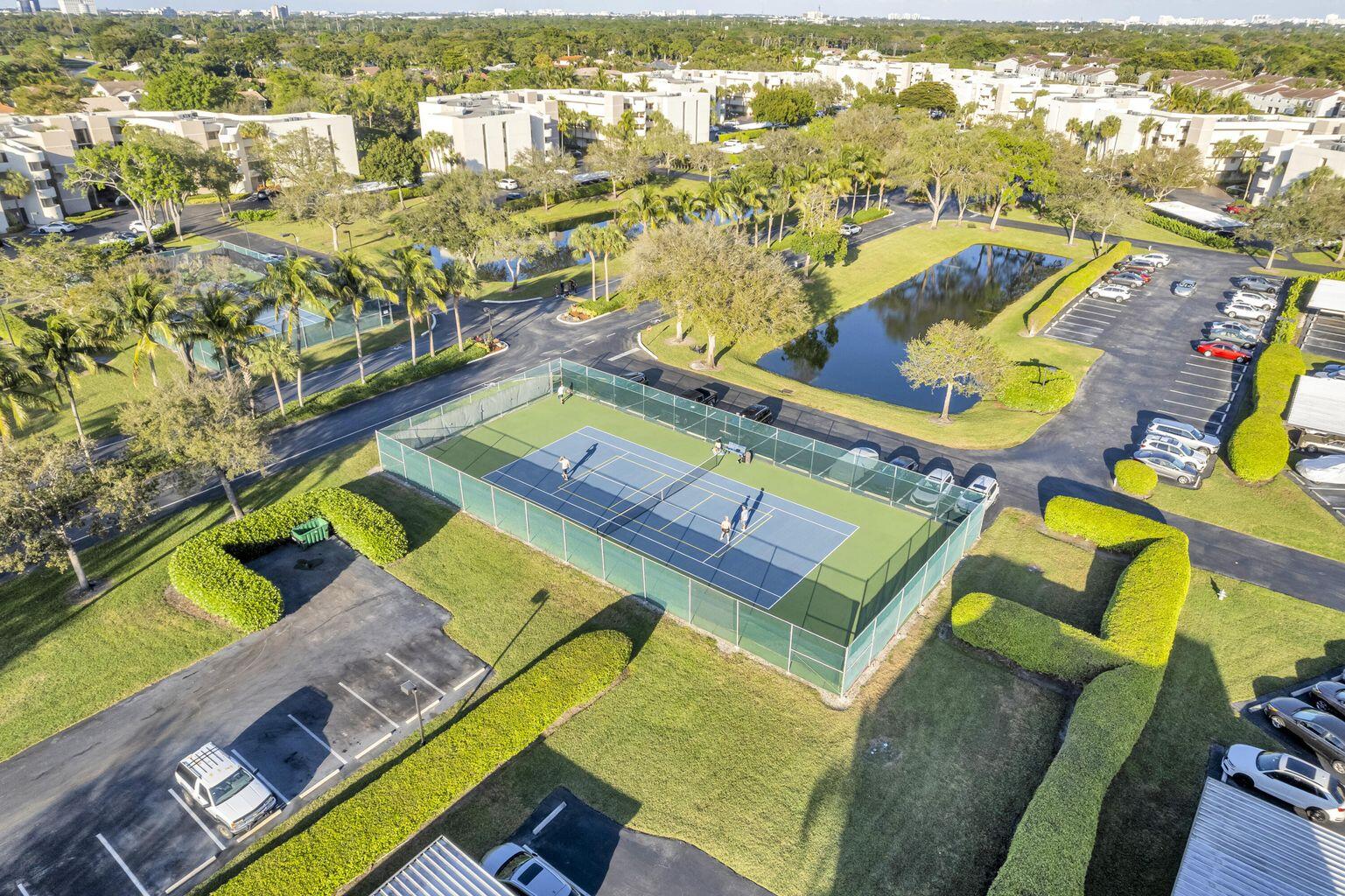 5650 Camino Del Sol, Unit 205 Boca Raton, FL 33433 - Photo 22 of 22 an aerial view of tennis court