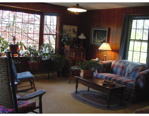 26 Indian Neck Road Wareham, MA 02571 - Photo 3 of 4 a living room with furniture and a window