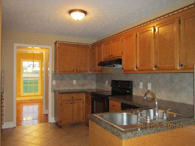3215 York Road Pleasant View, TN 37146 - Photo 9 of 20 Additional View of Kitchen shows new Stove and Vent Hood. Also has new lighting.