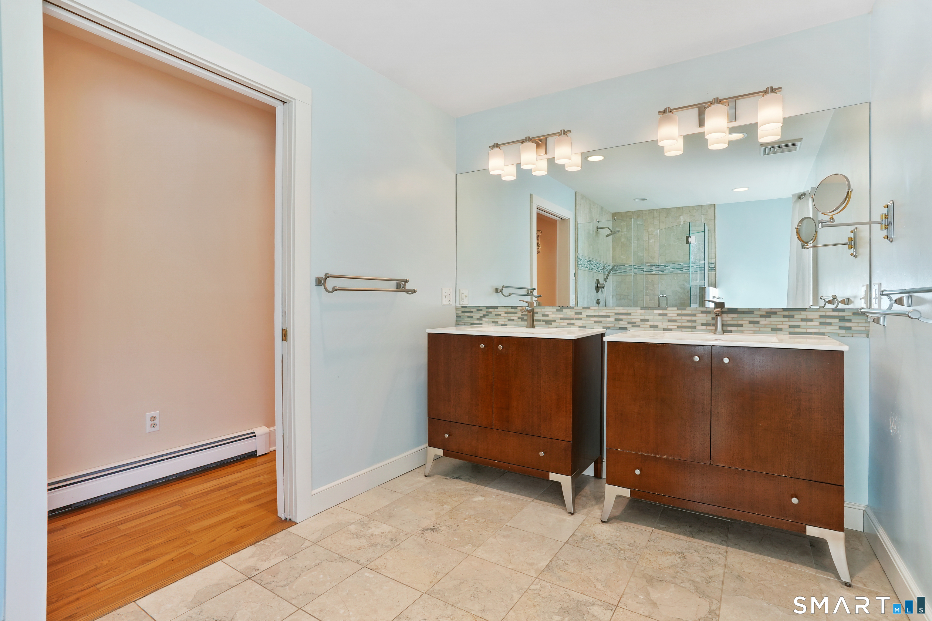 297 Long Mountain Road New Milford, CT 06776 - Photo 17 of 40 a bathroom with a sink and a mirror
