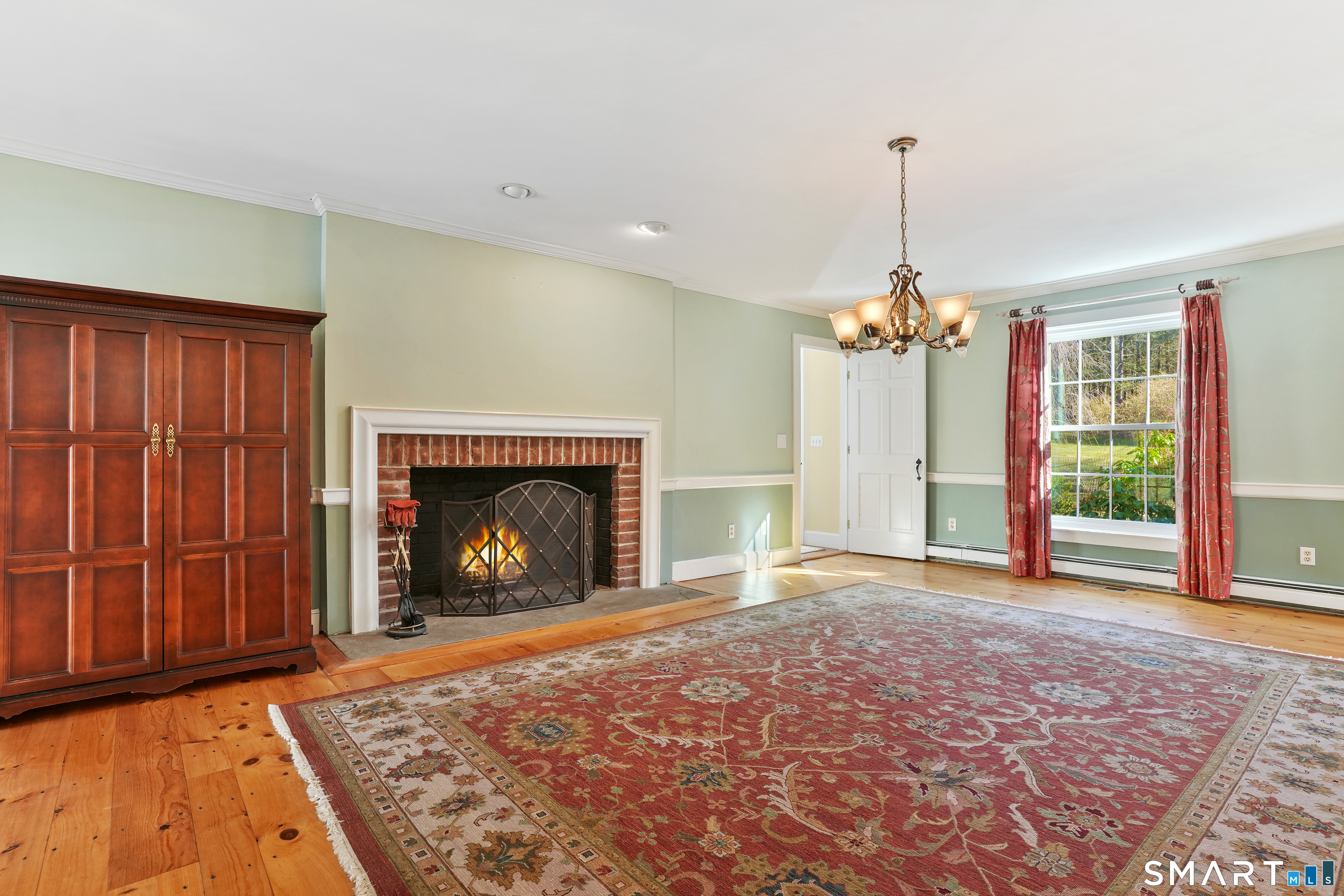 297 Long Mountain Road New Milford, CT 06776 - Photo 21 of 40 a view of empty room with a fireplace
