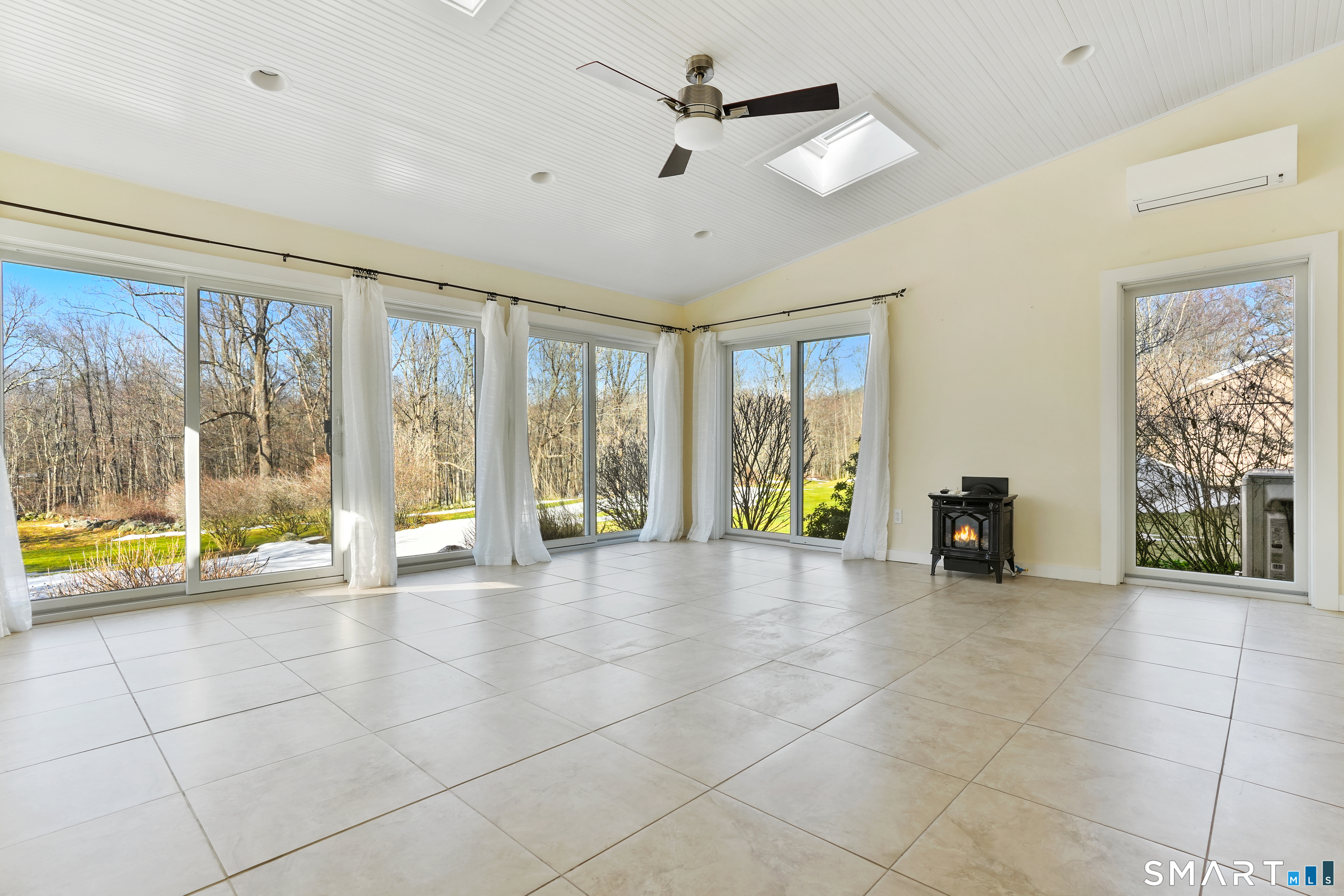 297 Long Mountain Road New Milford, CT 06776 - Photo 23 of 40 a view of an entryway with a chandelier