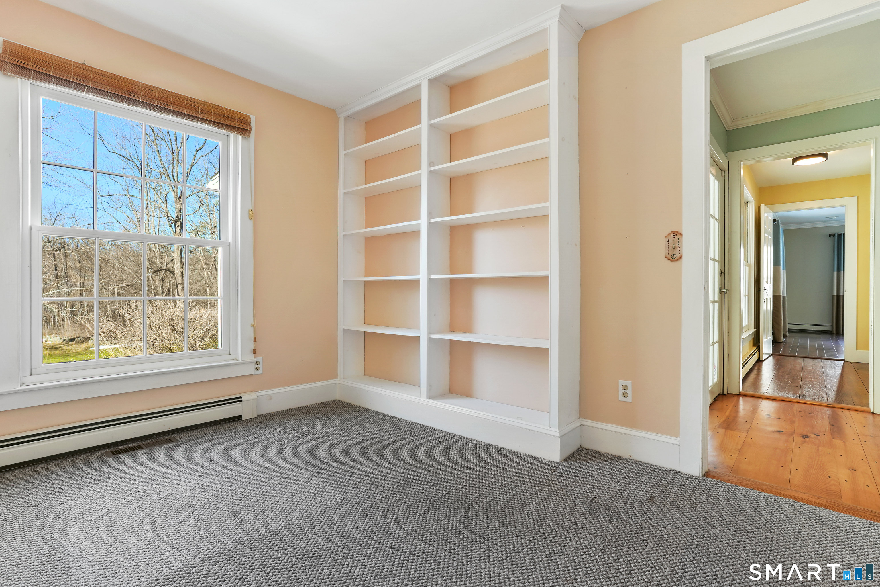 297 Long Mountain Road New Milford, CT 06776 - Photo 26 of 40 a view of an empty room with a window