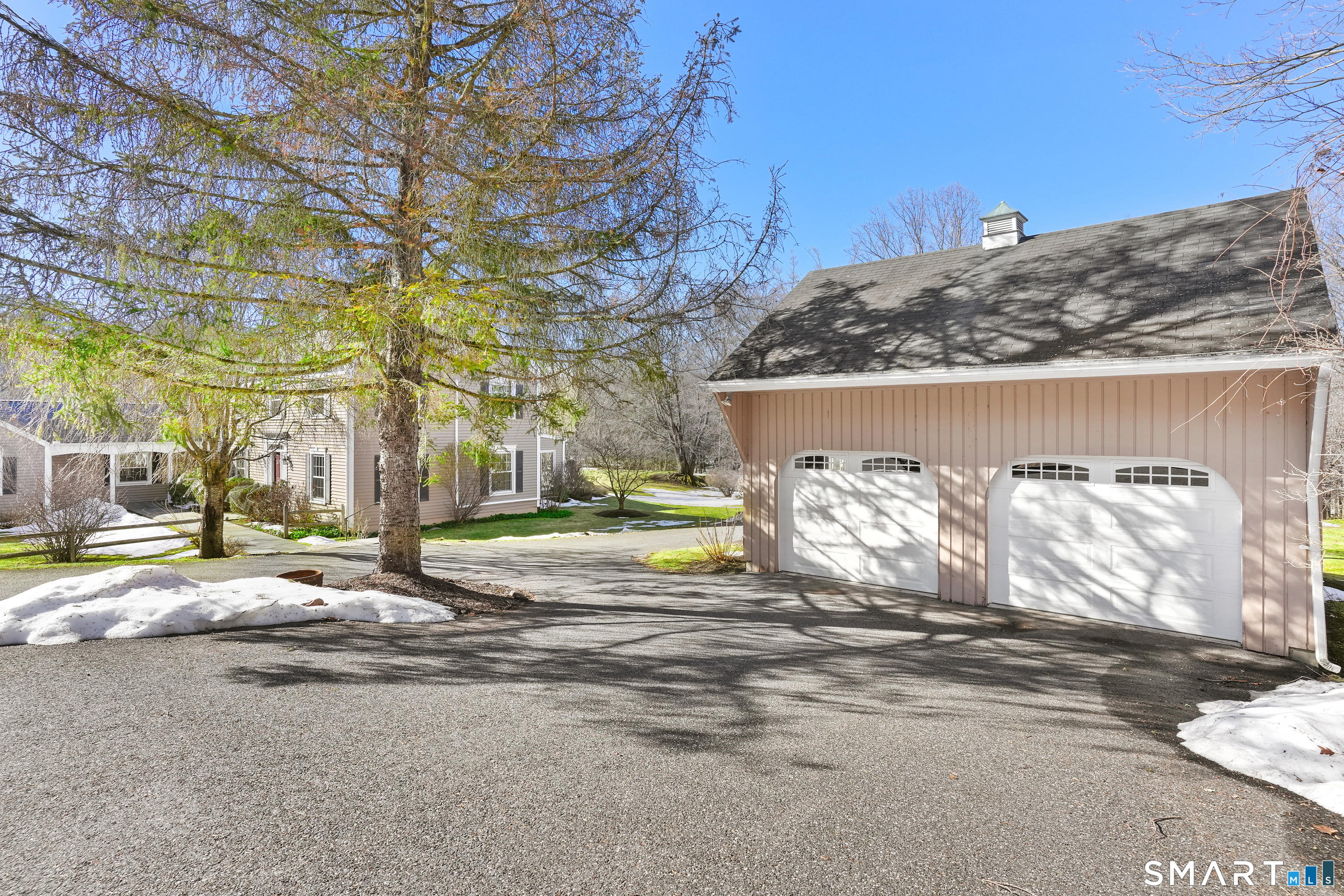 297 Long Mountain Road New Milford, CT 06776 - Photo 3 of 40 a view of a street with a building in the background