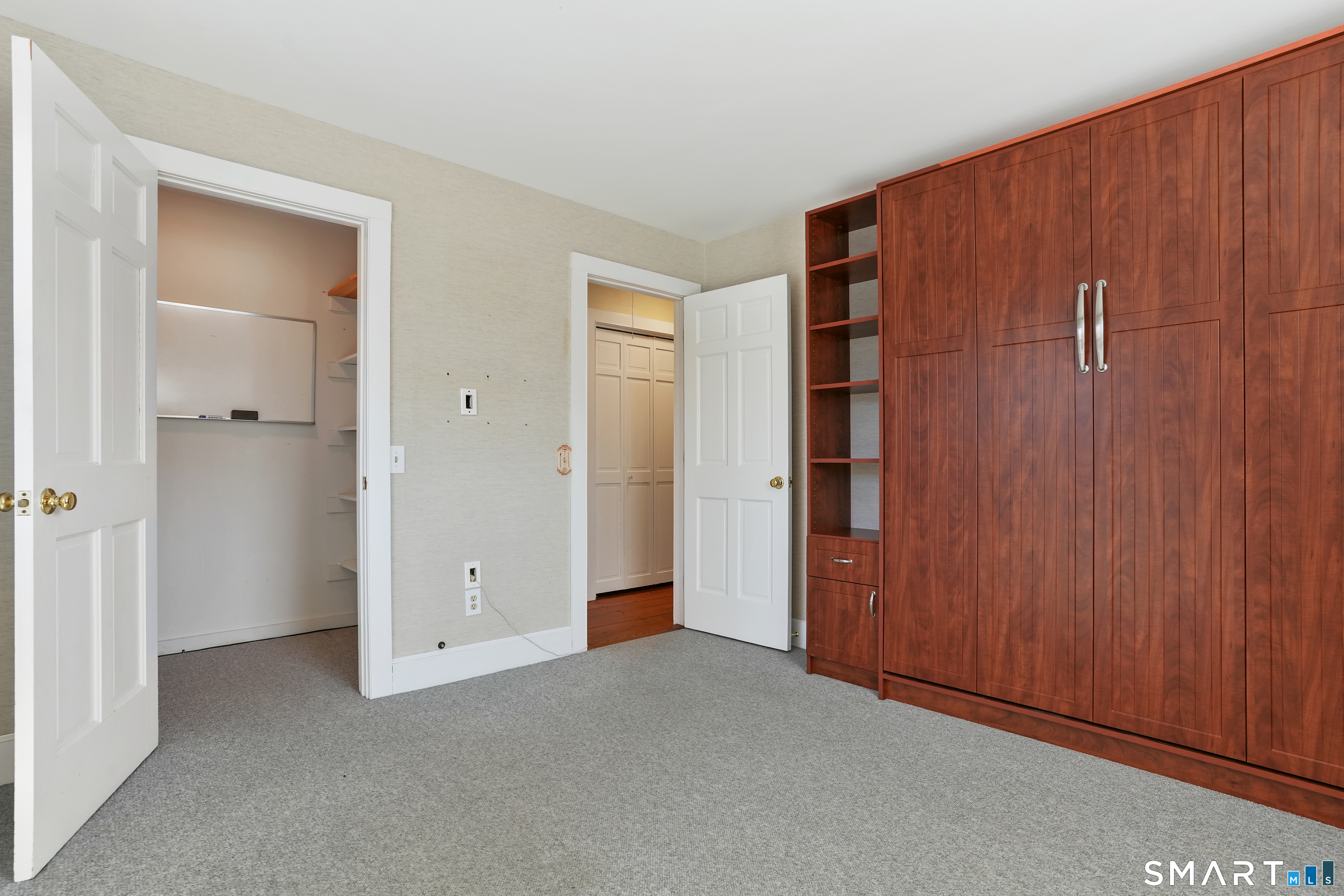 297 Long Mountain Road New Milford, CT 06776 - Photo 33 of 40 a view of an empty room with closet area