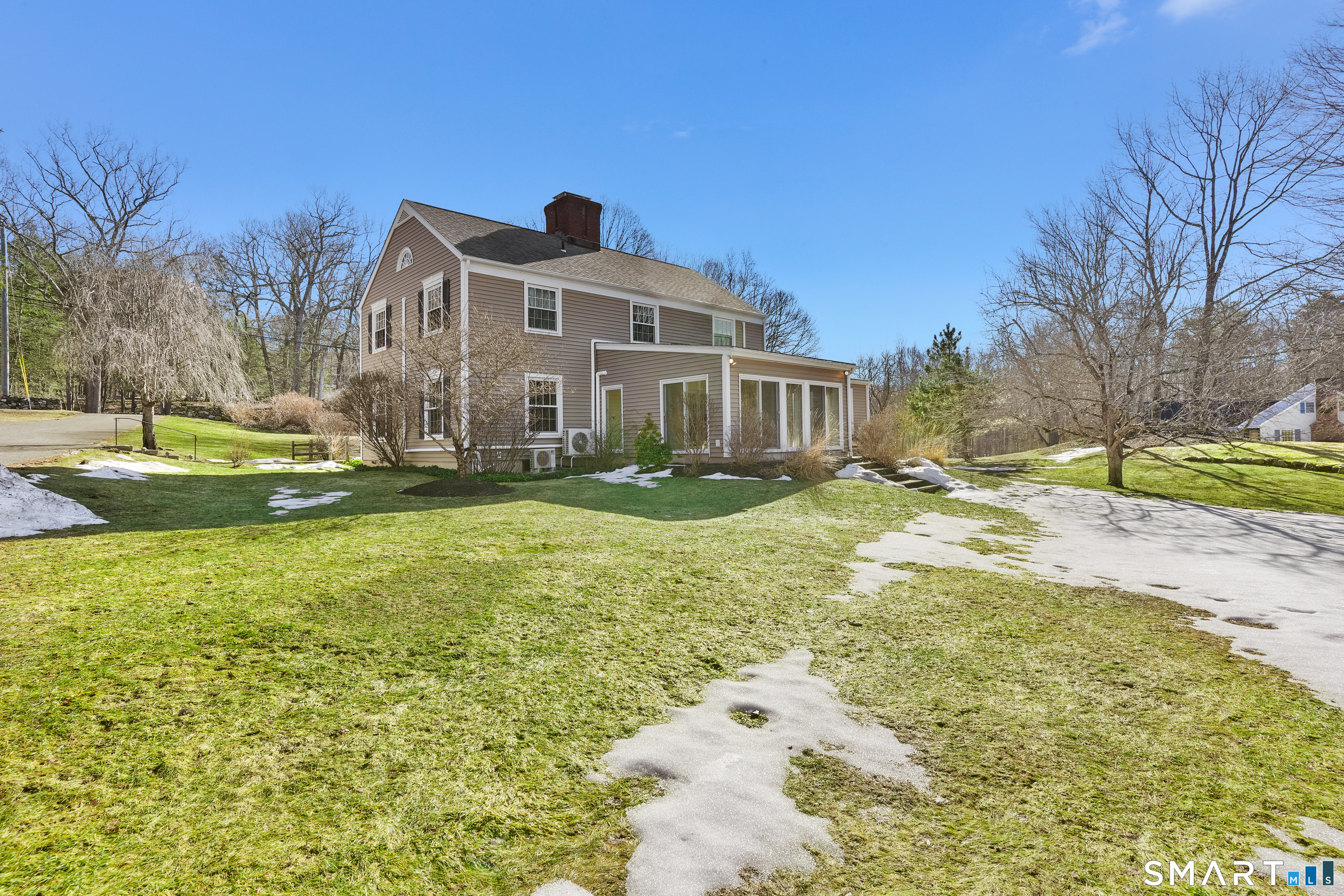 297 Long Mountain Road New Milford, CT 06776 - Photo 37 of 40 a front view of a house with a yard