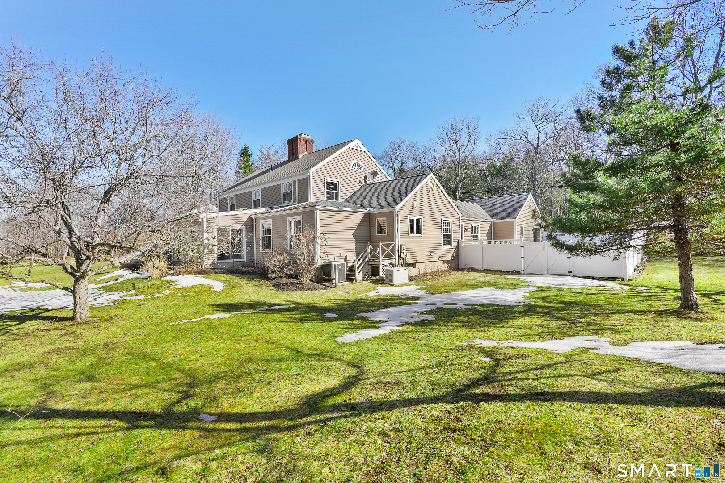 297 Long Mountain Road New Milford, CT 06776 - Photo 38 of 40 a view of a house with a big yard and large trees