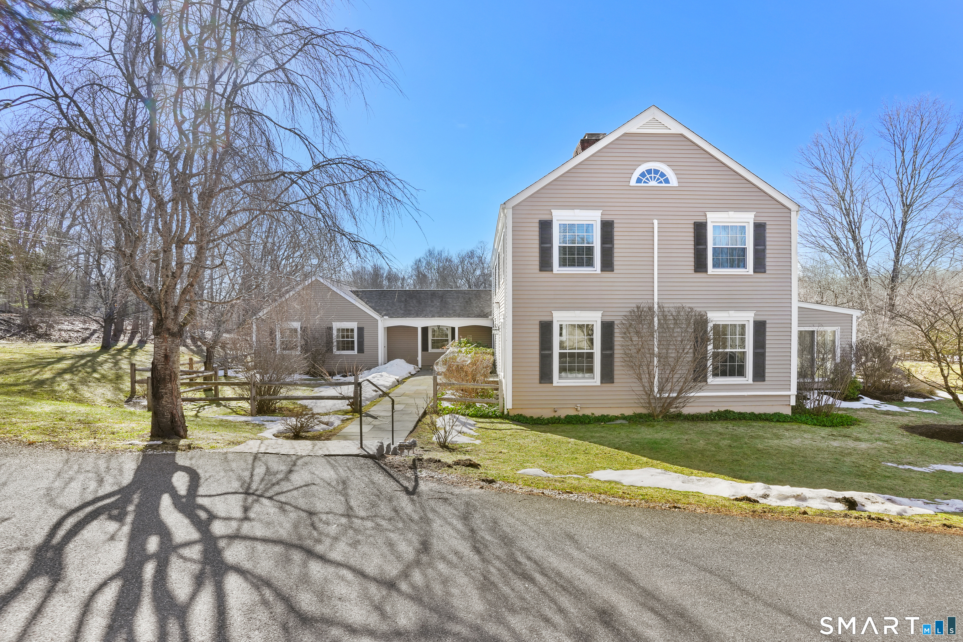 297 Long Mountain Road New Milford, CT 06776 - Photo 4 of 40 a front view of a house with a yard