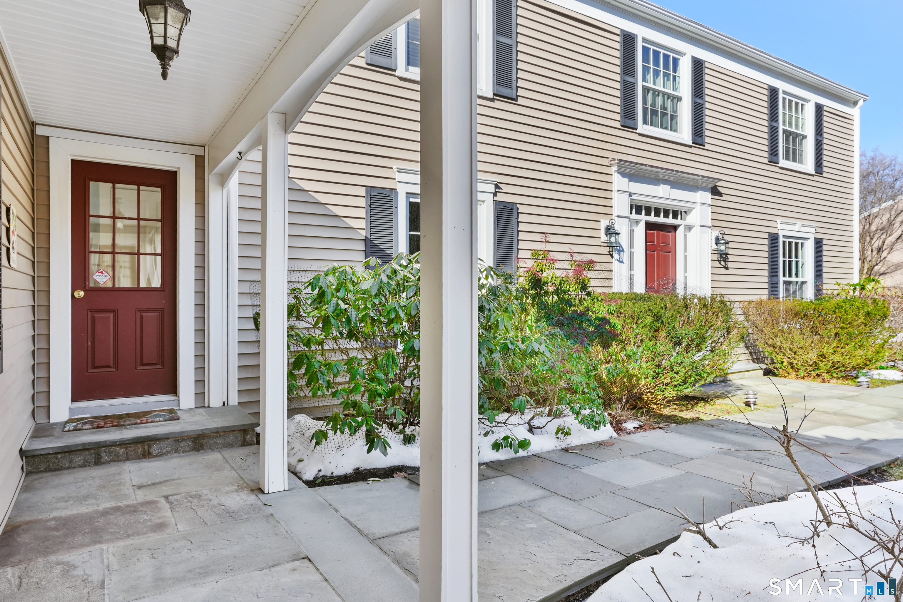 297 Long Mountain Road New Milford, CT 06776 - Photo 7 of 40 a view of a entryway door front of house