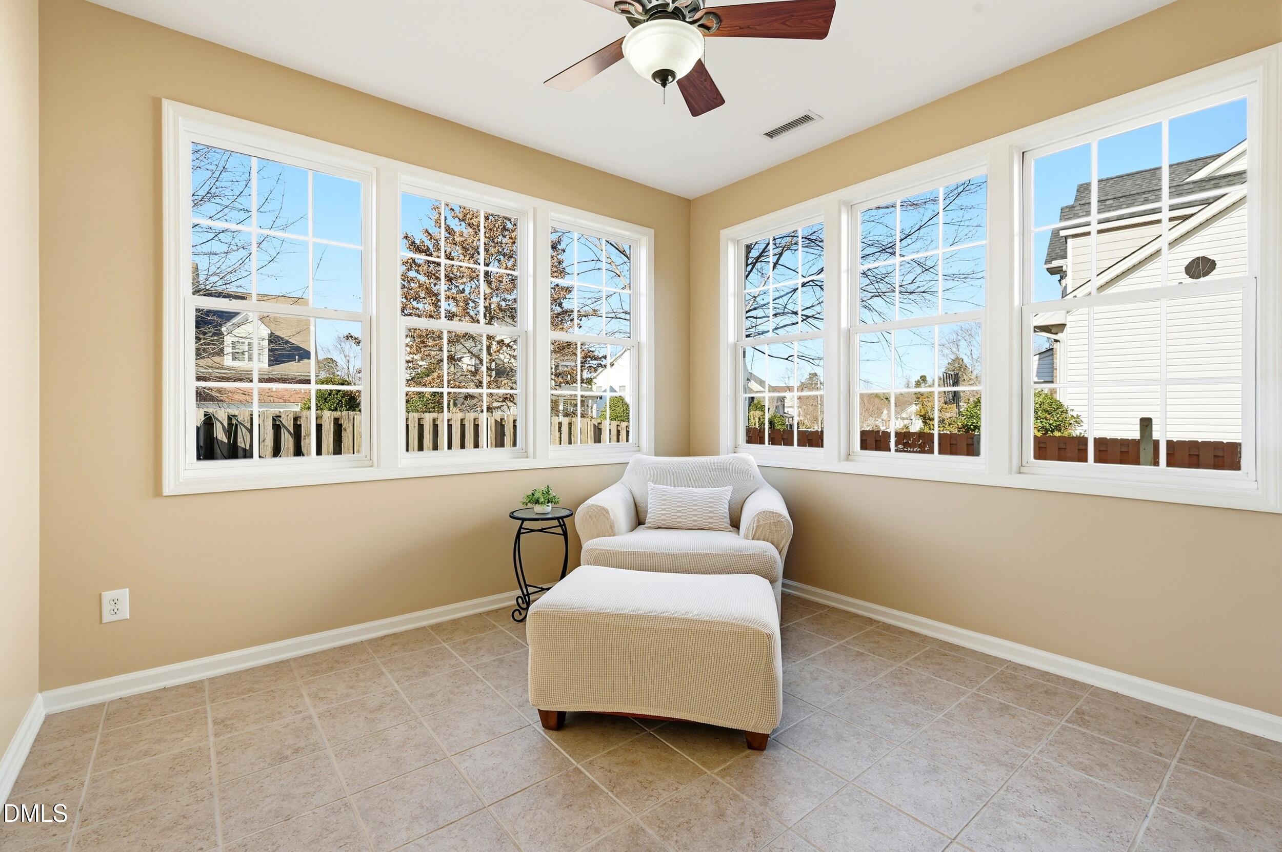 5401 Onyx Mill Court Raleigh, NC 27616 - Photo 12 of 48 a living room with furniture and a large window