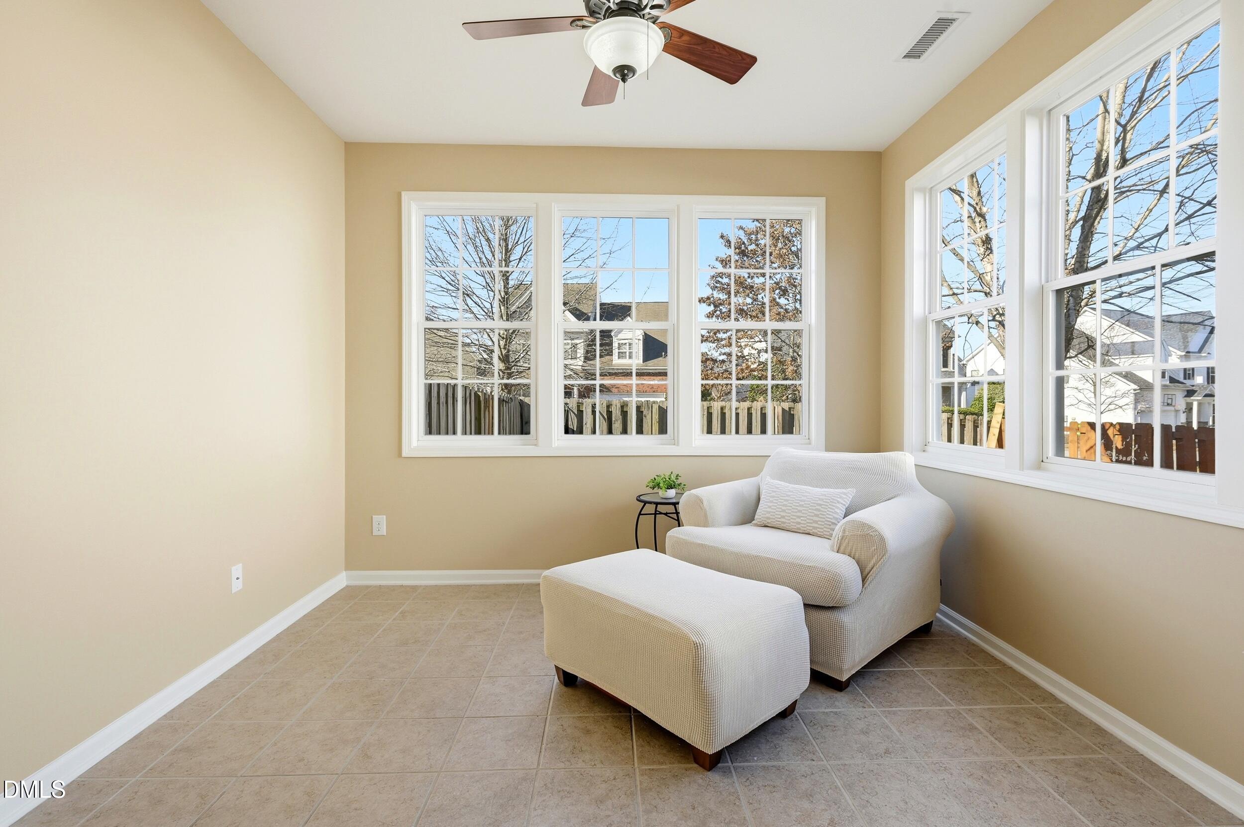 5401 Onyx Mill Court Raleigh, NC 27616 - Photo 13 of 48 a bedroom with a bed and a large window